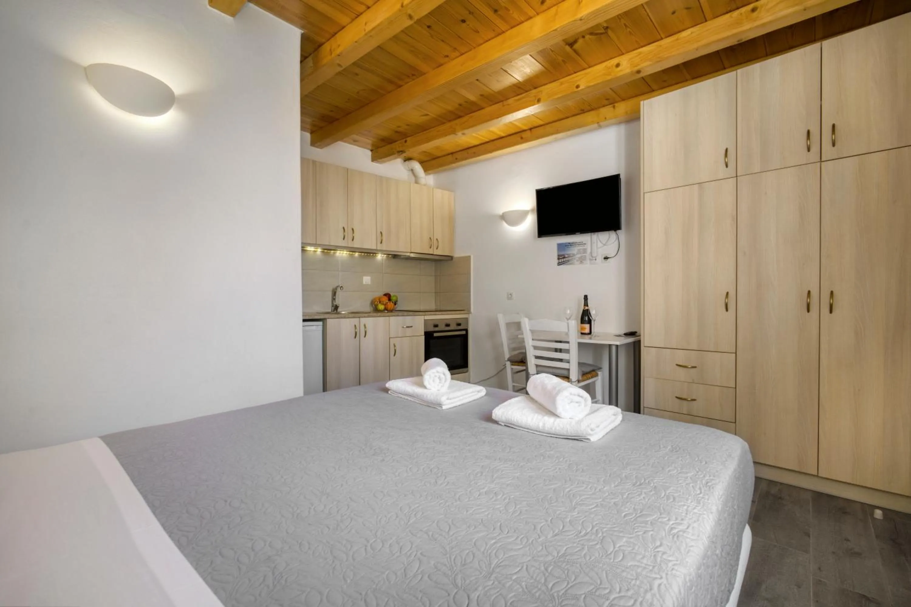 Bed in Anius Apartments