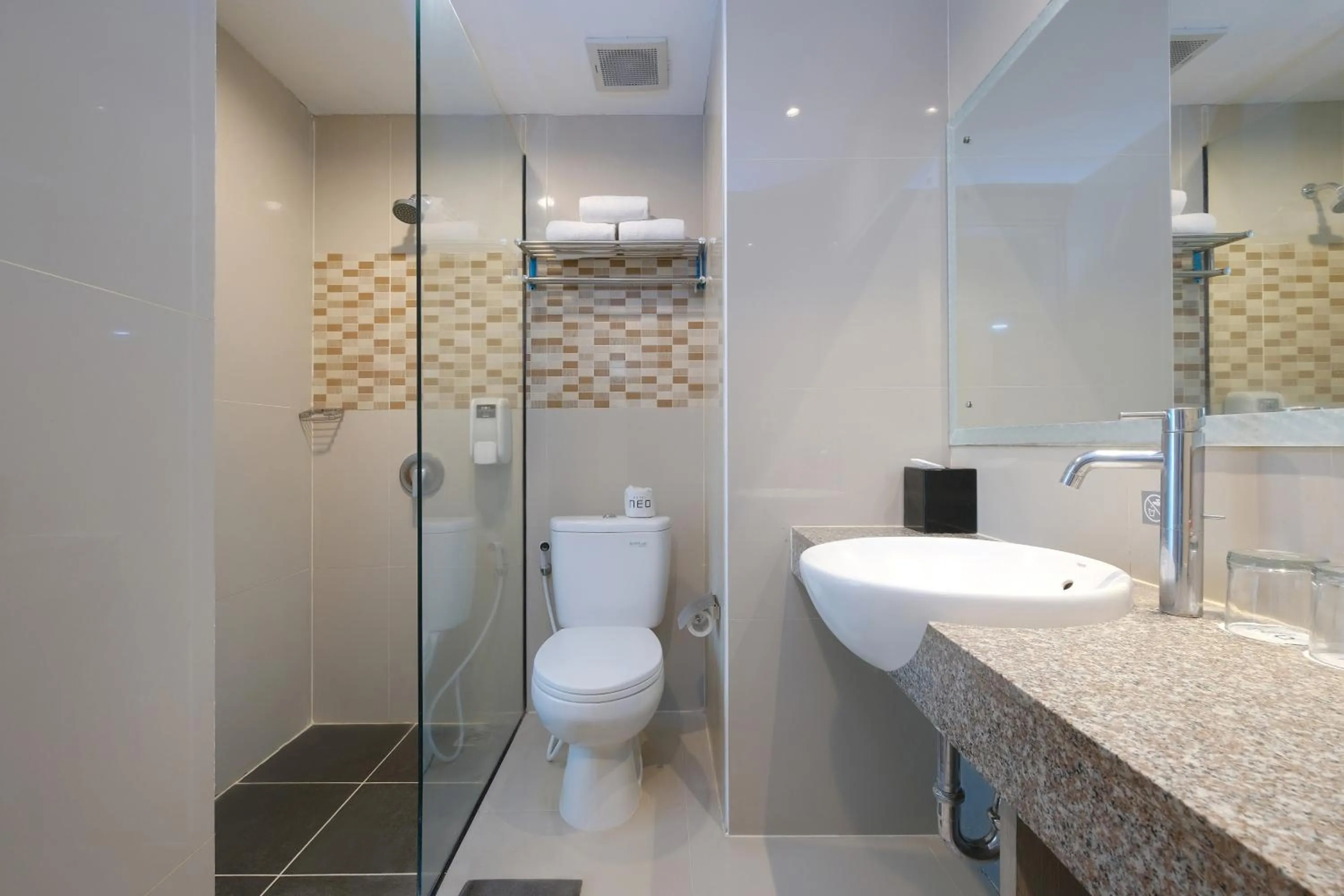 Bathroom in Hotel Neo Candi Simpang Lima - Semarang by ASTON