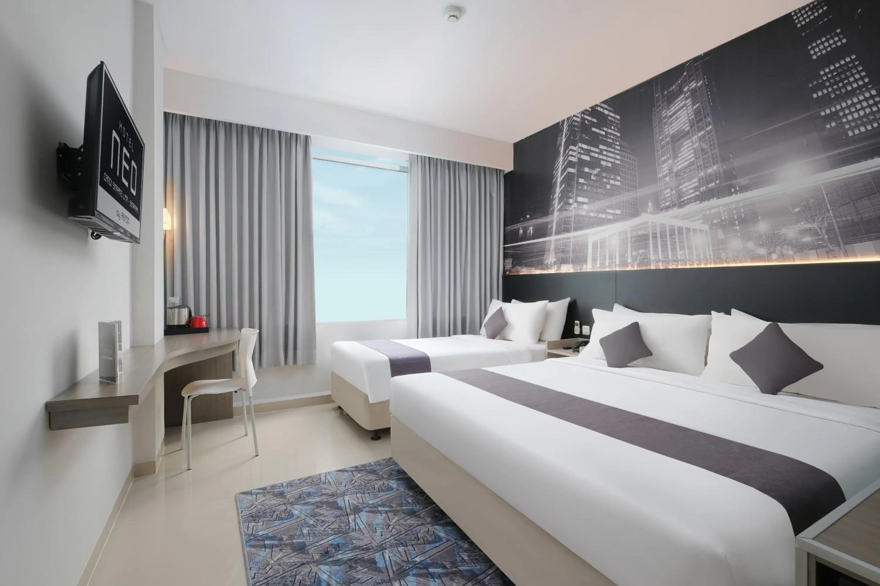 Bed in Hotel Neo Candi Simpang Lima - Semarang by ASTON
