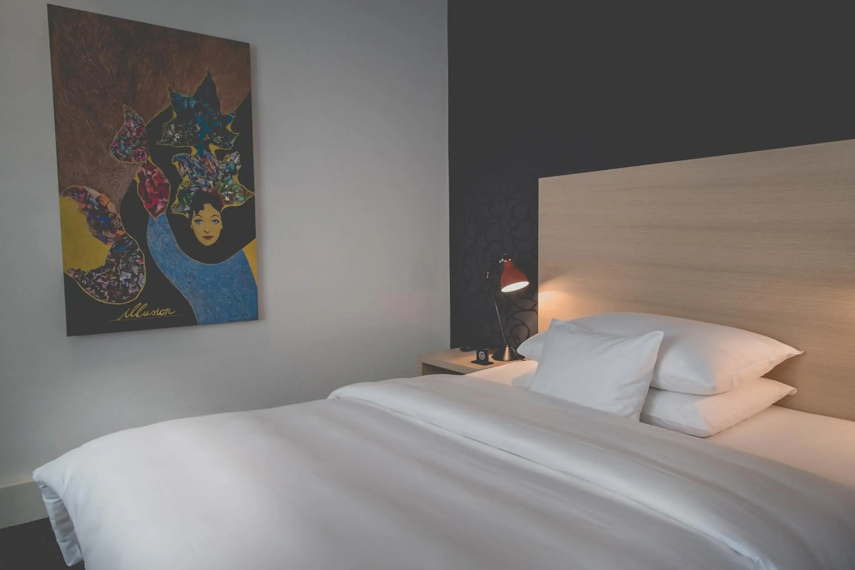 Bed in Hotel Mon Repos Bed in Hotel Mon Repos