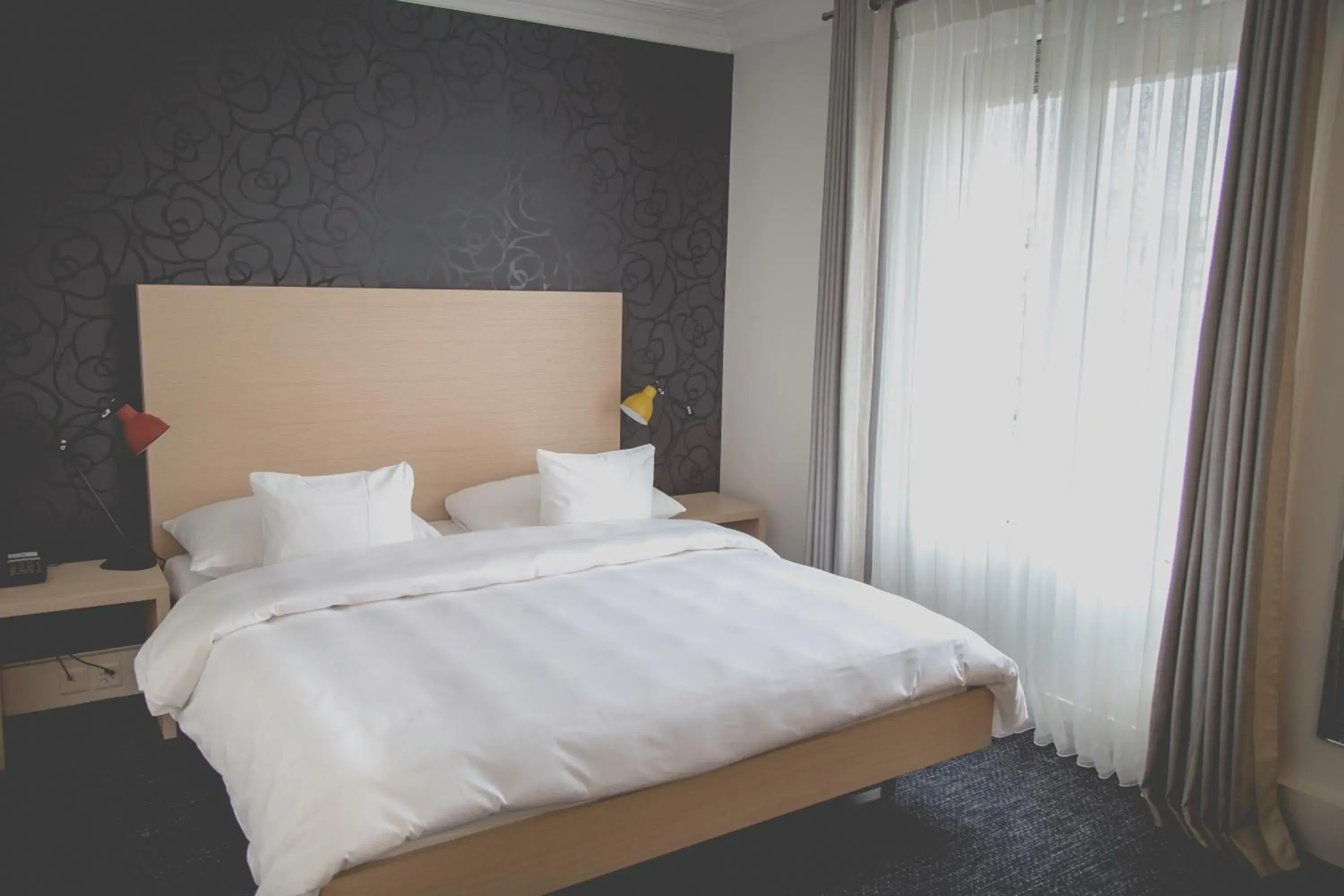 Bed in Hotel Mon Repos Bed in Hotel Mon Repos