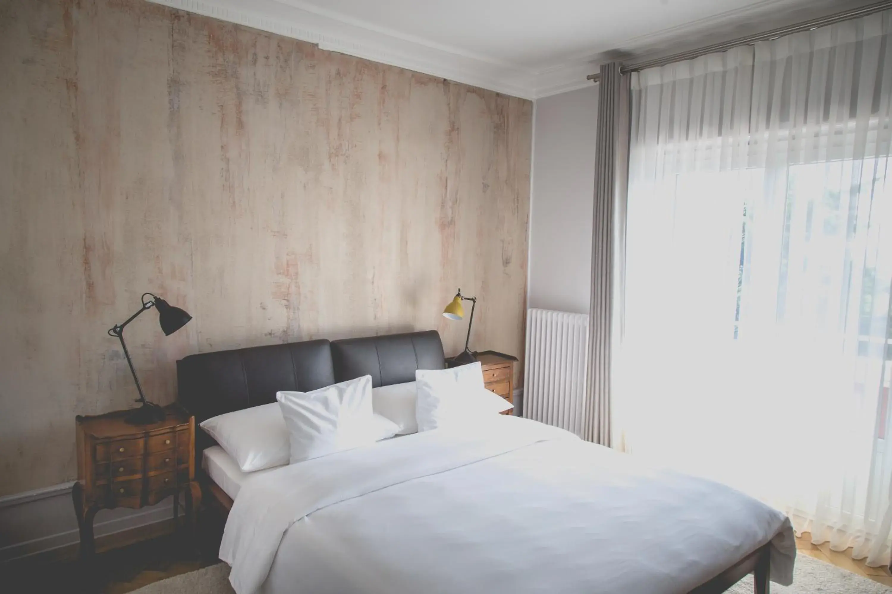 Bed in Hotel Mon Repos Bed in Hotel Mon Repos