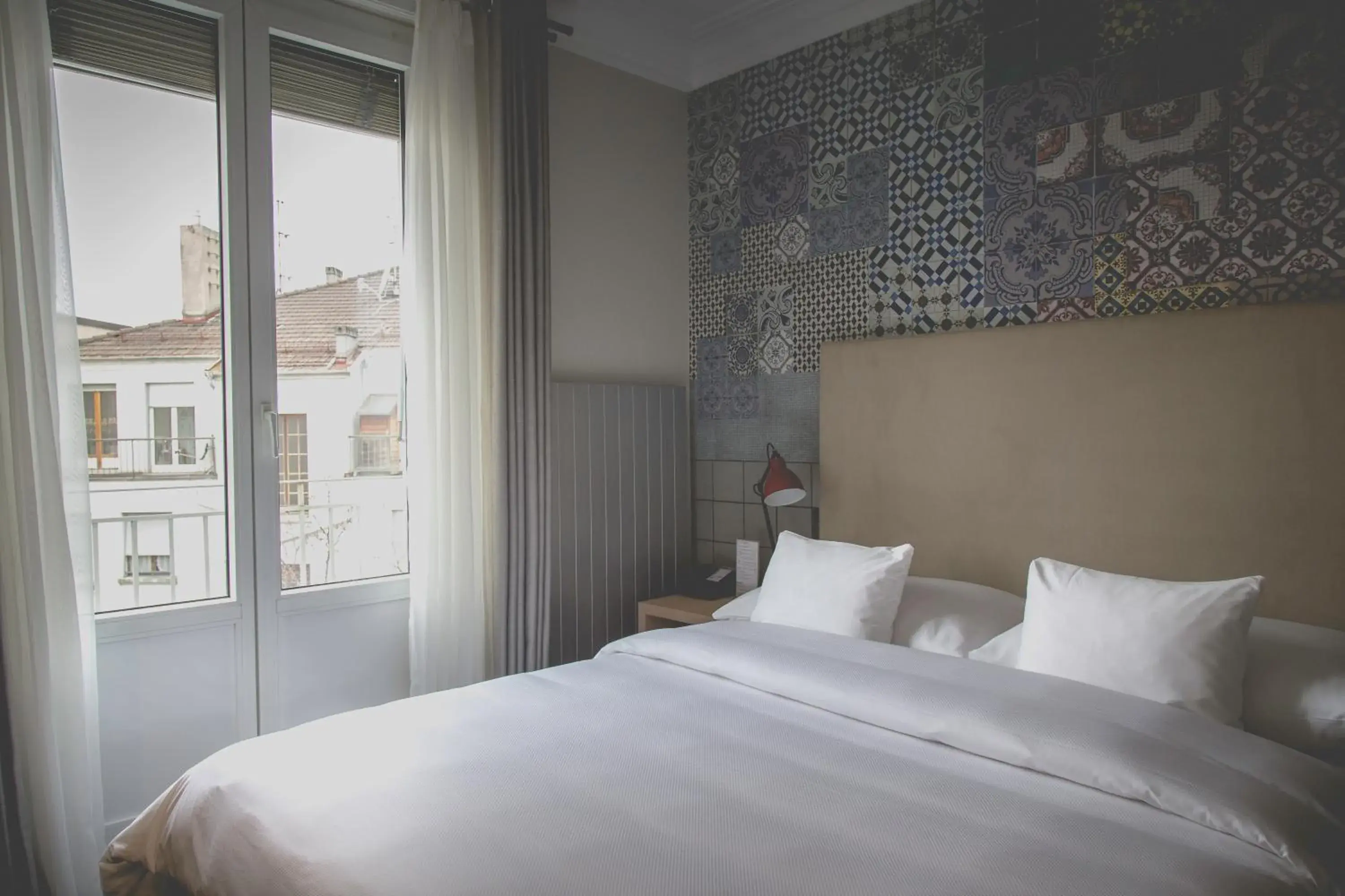 Bed in Hotel Mon Repos Bed in Hotel Mon Repos