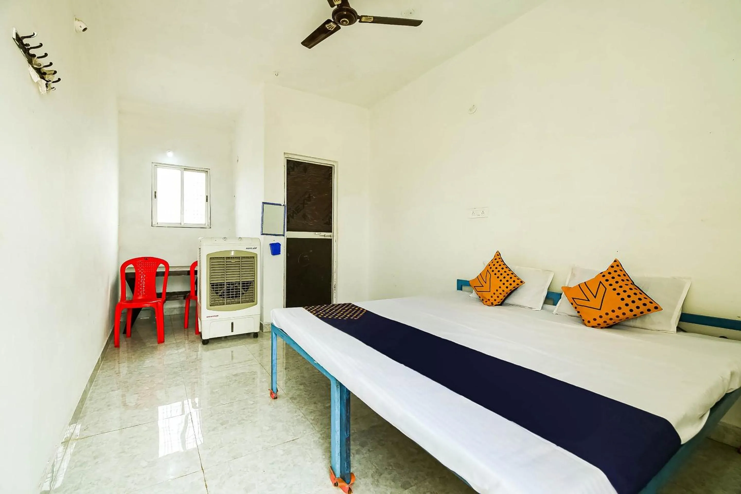 Bedroom, Bed in SPOT ON by OYO Krishna Market And Lodge