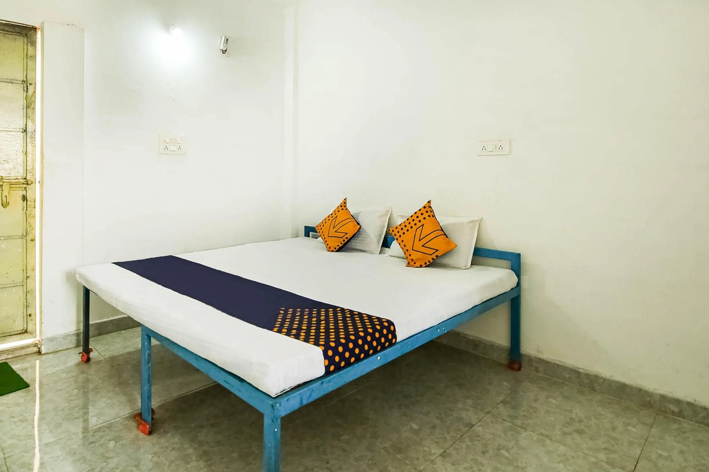 Bedroom, Bed in SPOT ON by OYO Krishna Market And Lodge