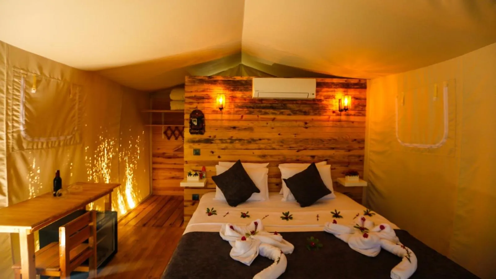 Bed in Green Pine Bungalows & Beach Luxury Concept