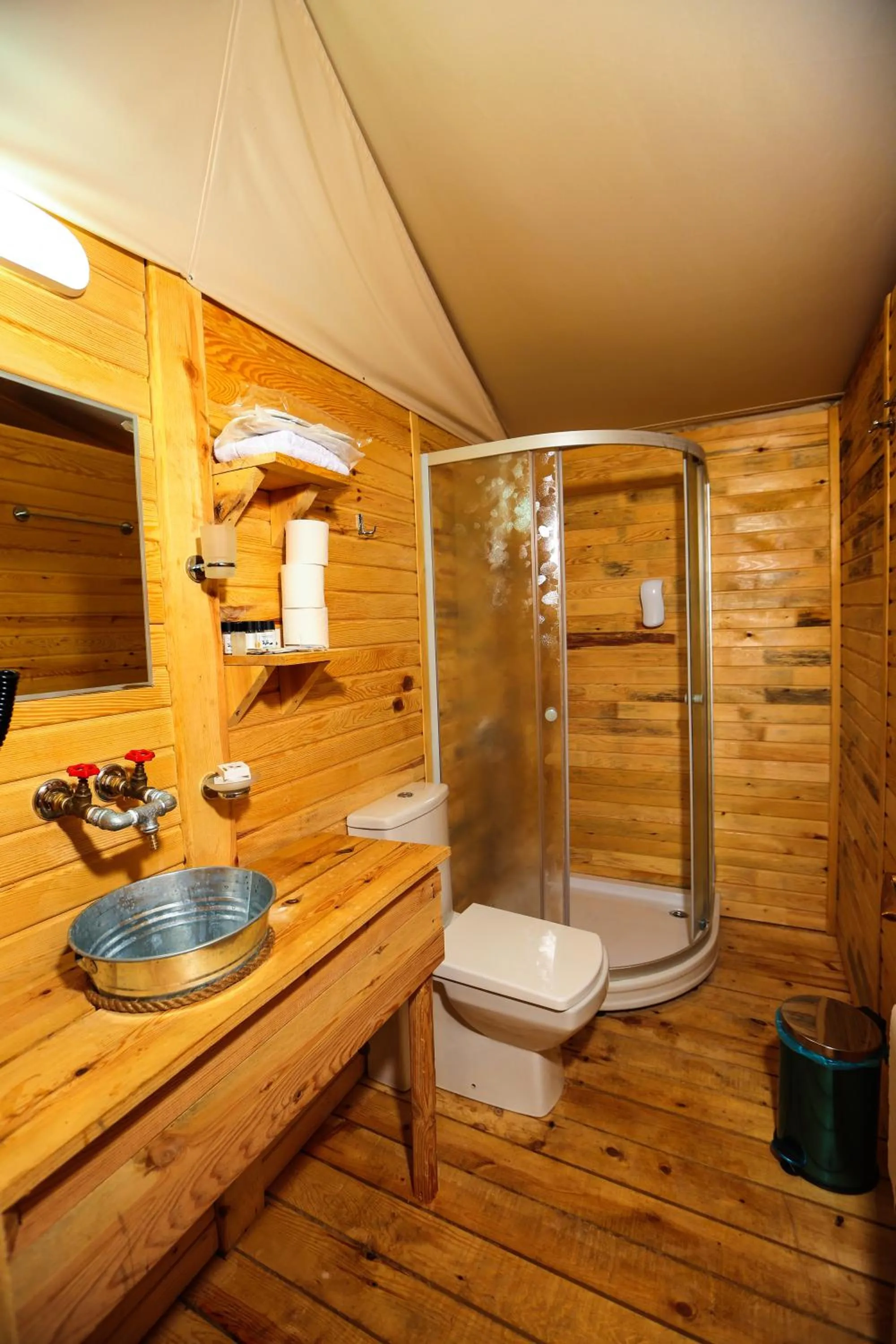 Shower in Green Pine Bungalows & Beach Luxury Concept