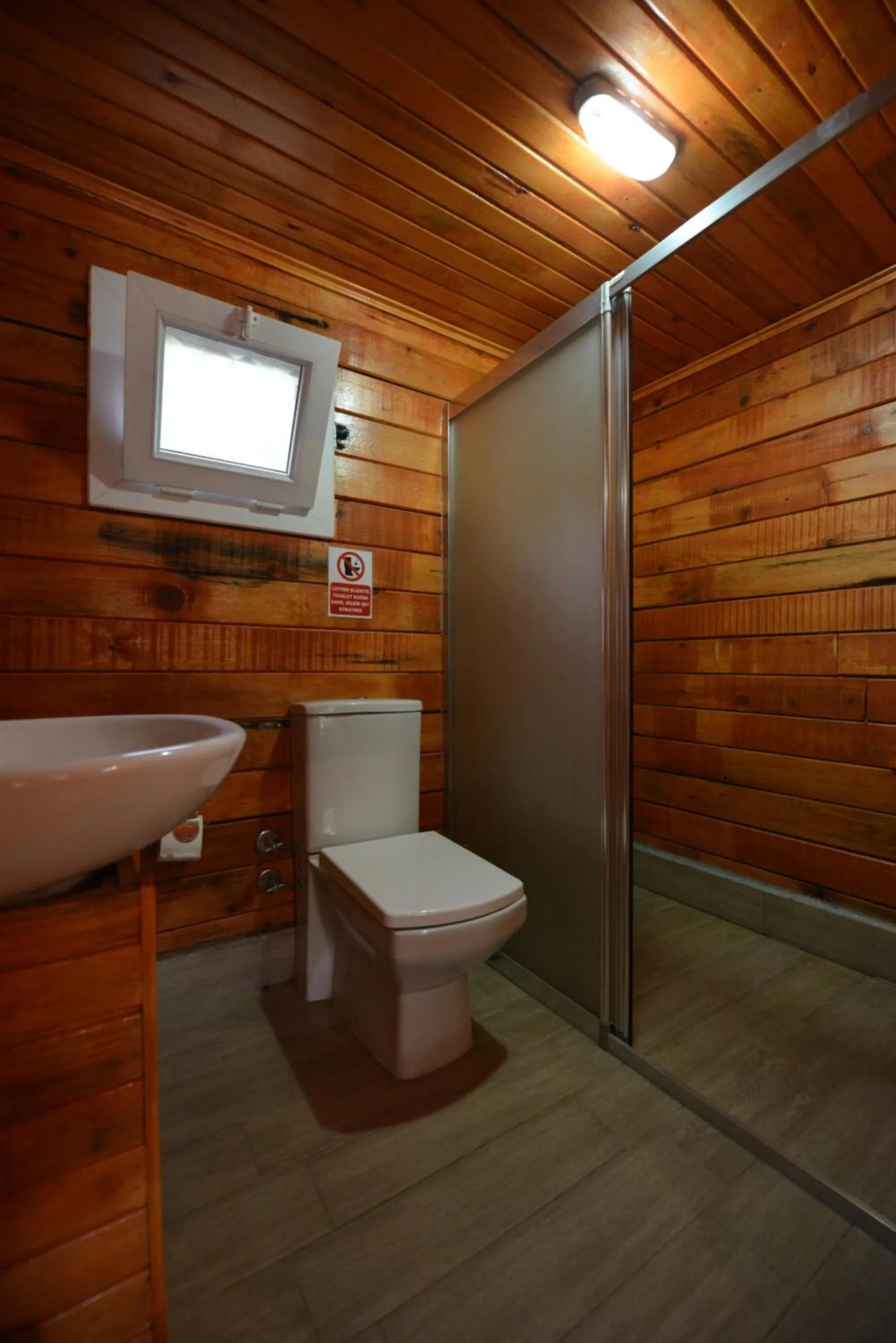 Shower in Green Pine Bungalows & Beach Luxury Concept