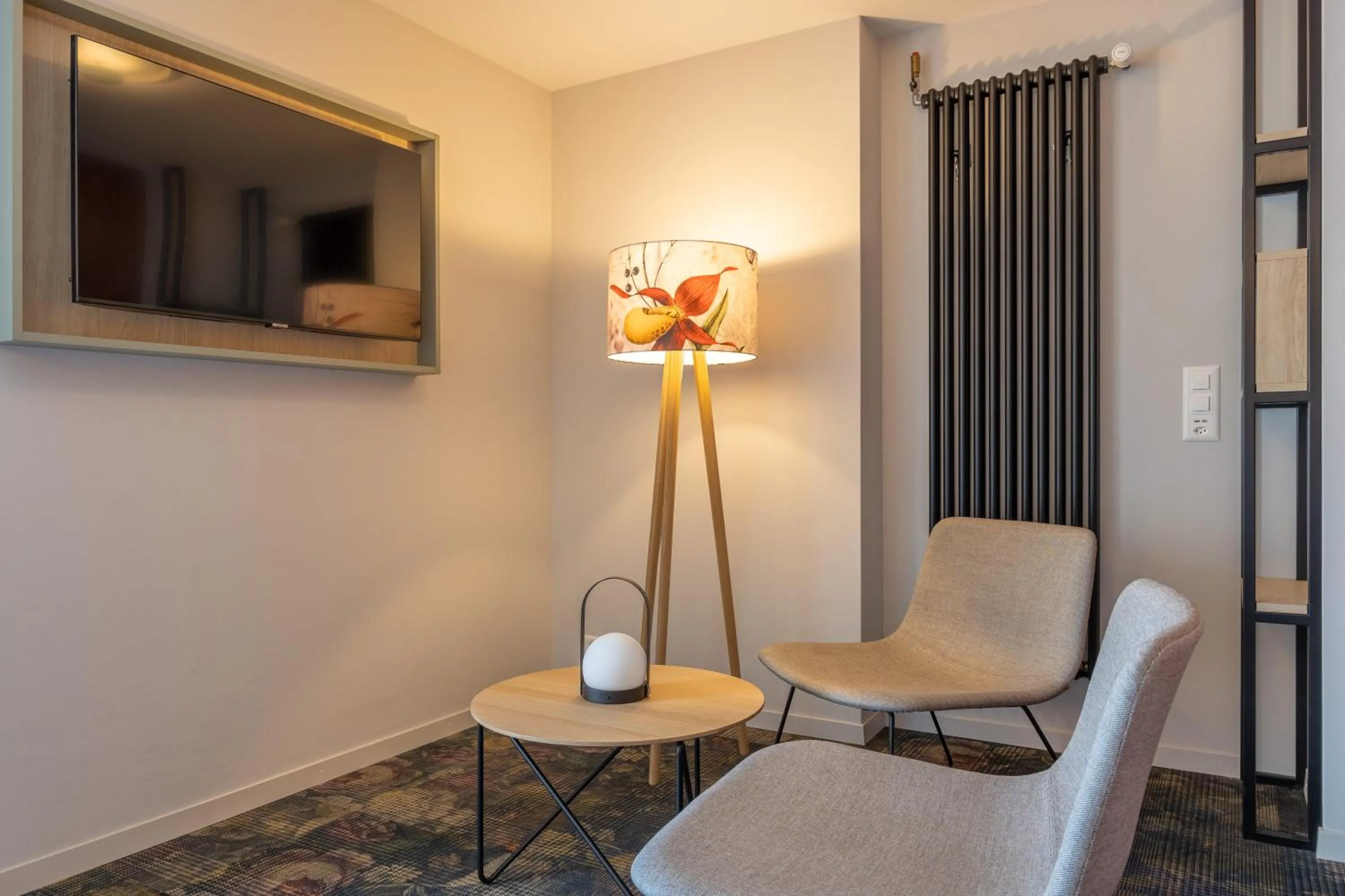 Bedroom in Stella Swiss Quality Hotel