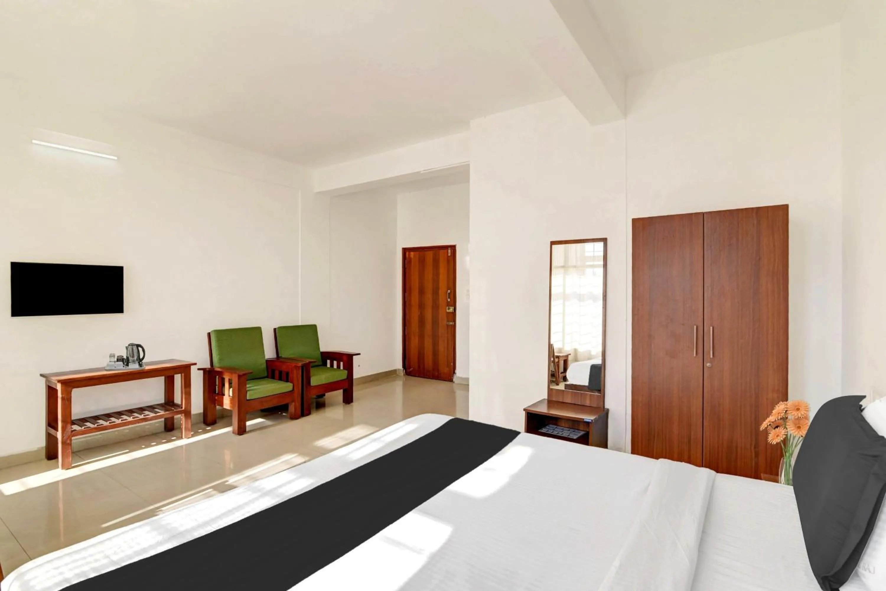 Bedroom, Bed in Super Collection O Madikeri City Center Near KSRTC Bus Stand Coorg Formerly Hotel Ragsys