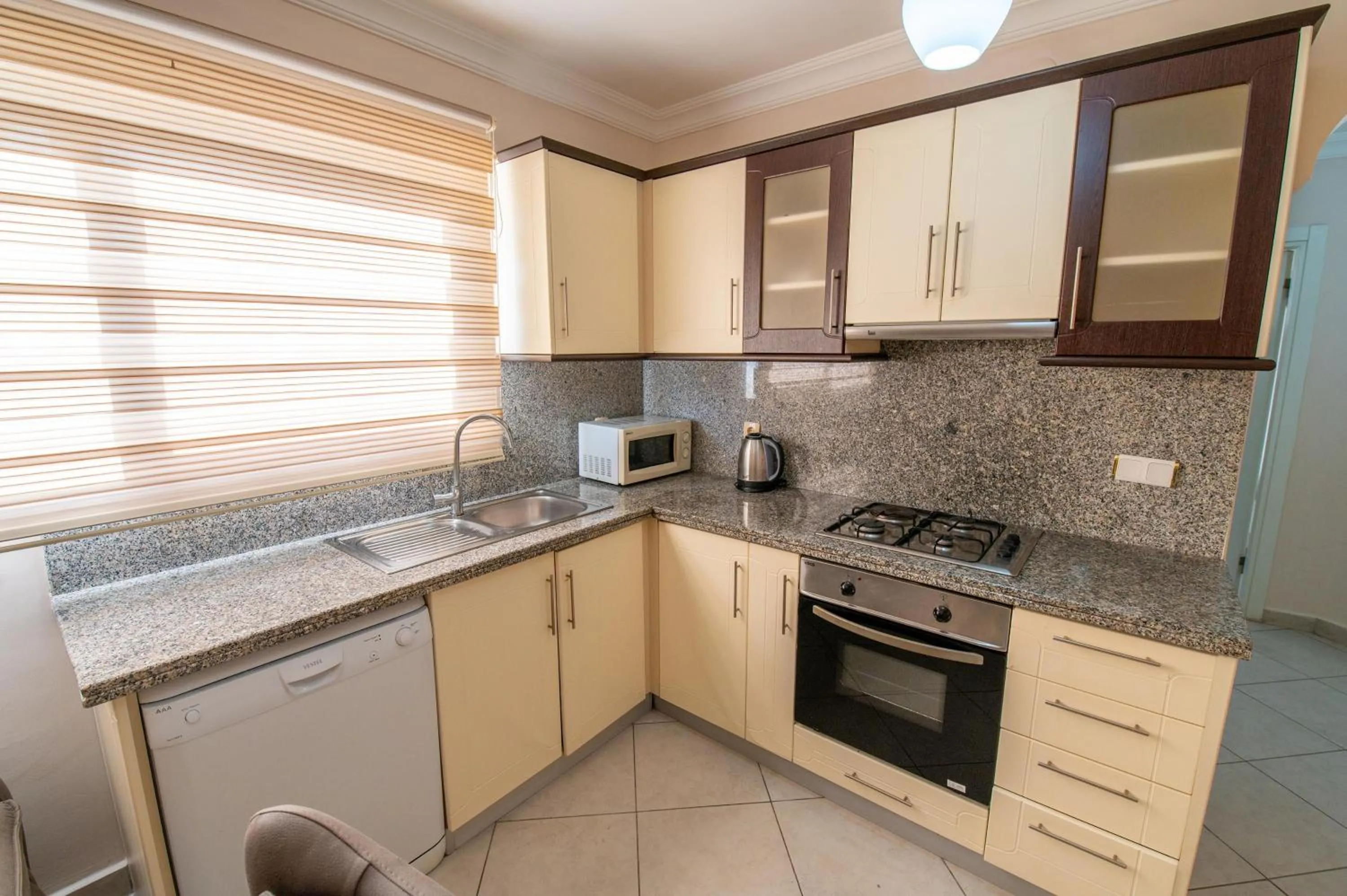 Kitchen or kitchenette in Sunset Beach Resort Aqua Lettings