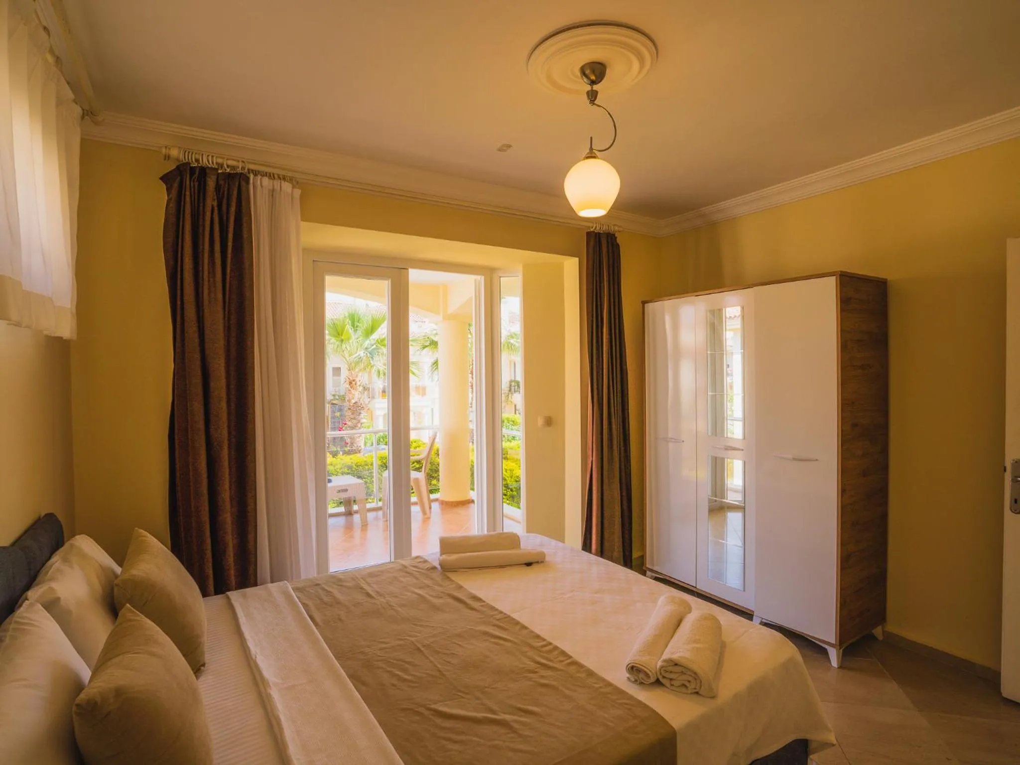 Photo of the whole room, Bed in Sunset Beach Resort Aqua Lettings