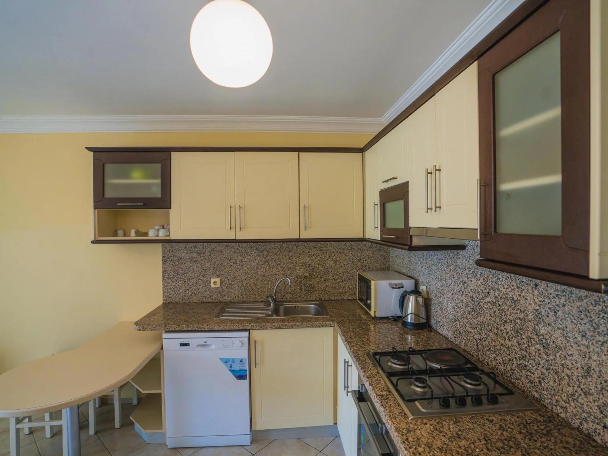 Kitchen or kitchenette in Sunset Beach Resort Aqua Lettings