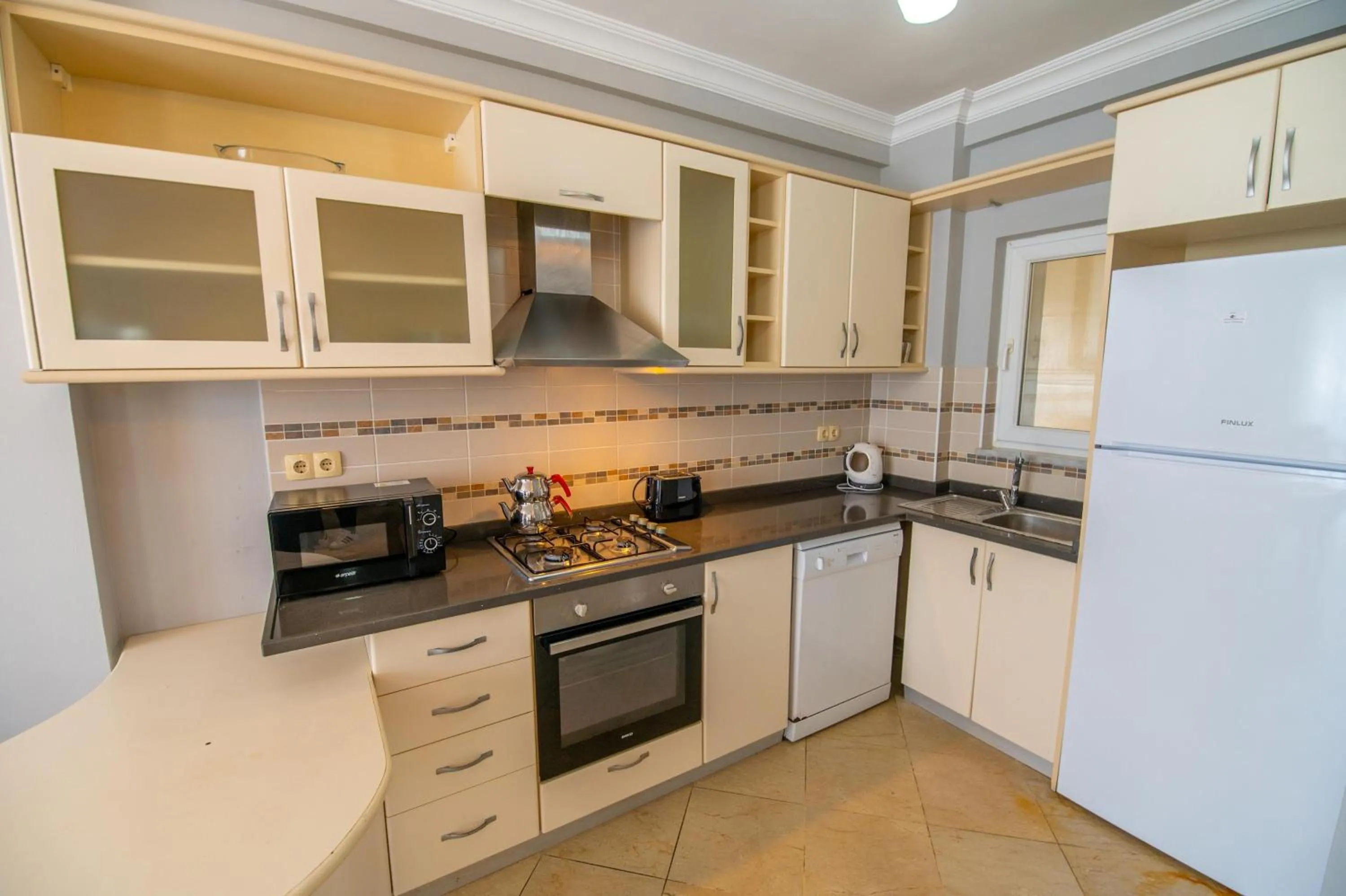 Kitchen or kitchenette in Sunset Beach Resort Aqua Lettings