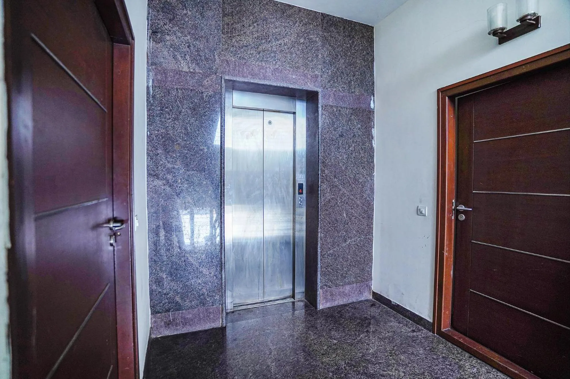 elevator in FabHotel Home Tree Service Apartment - Nr Anna Tower