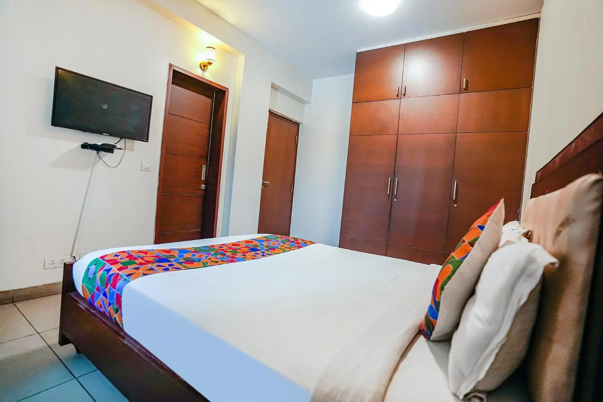 Communal lounge/ TV room, Bed in FabHotel Home Tree Service Apartment - Nr Anna Tower Communal lounge/ TV room, Bed in FabHotel Home Tree Service Apartment - Nr Anna Tower