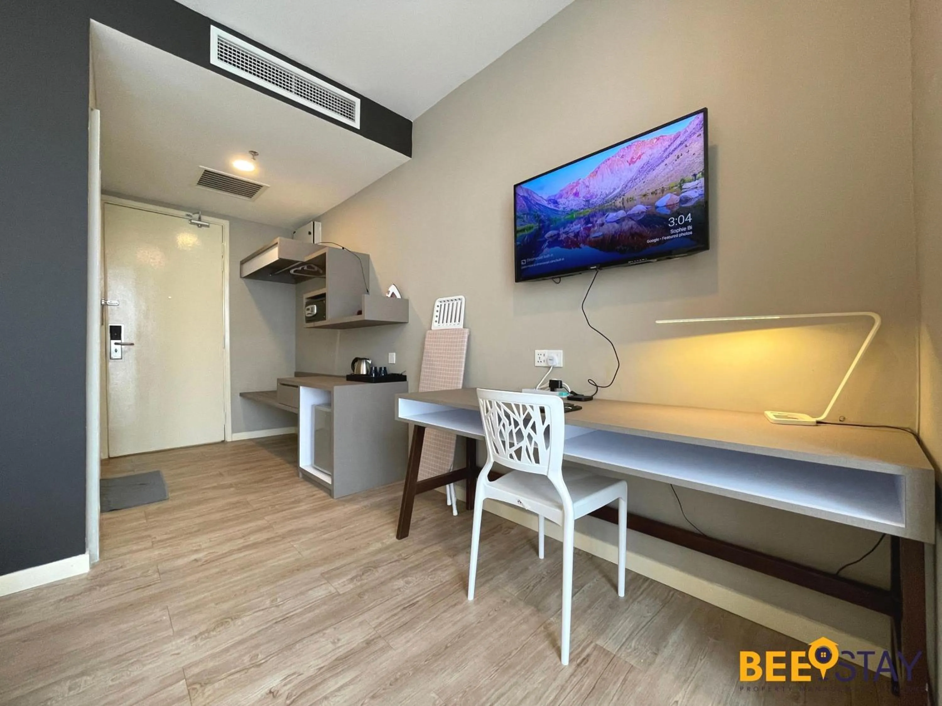Seating area, Bed in Empire Damansara Hotel Suites by Beestay