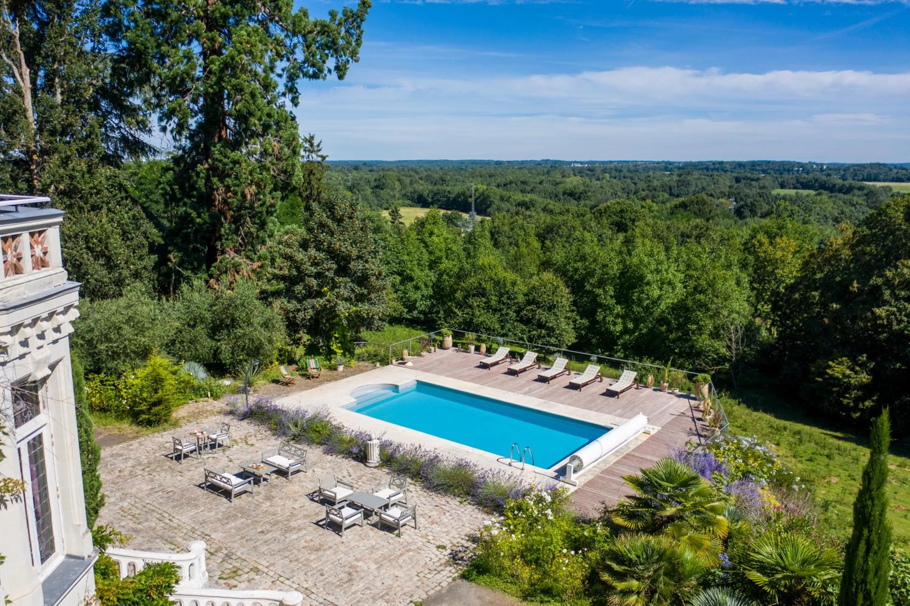 Pool view in Le Château des Forges