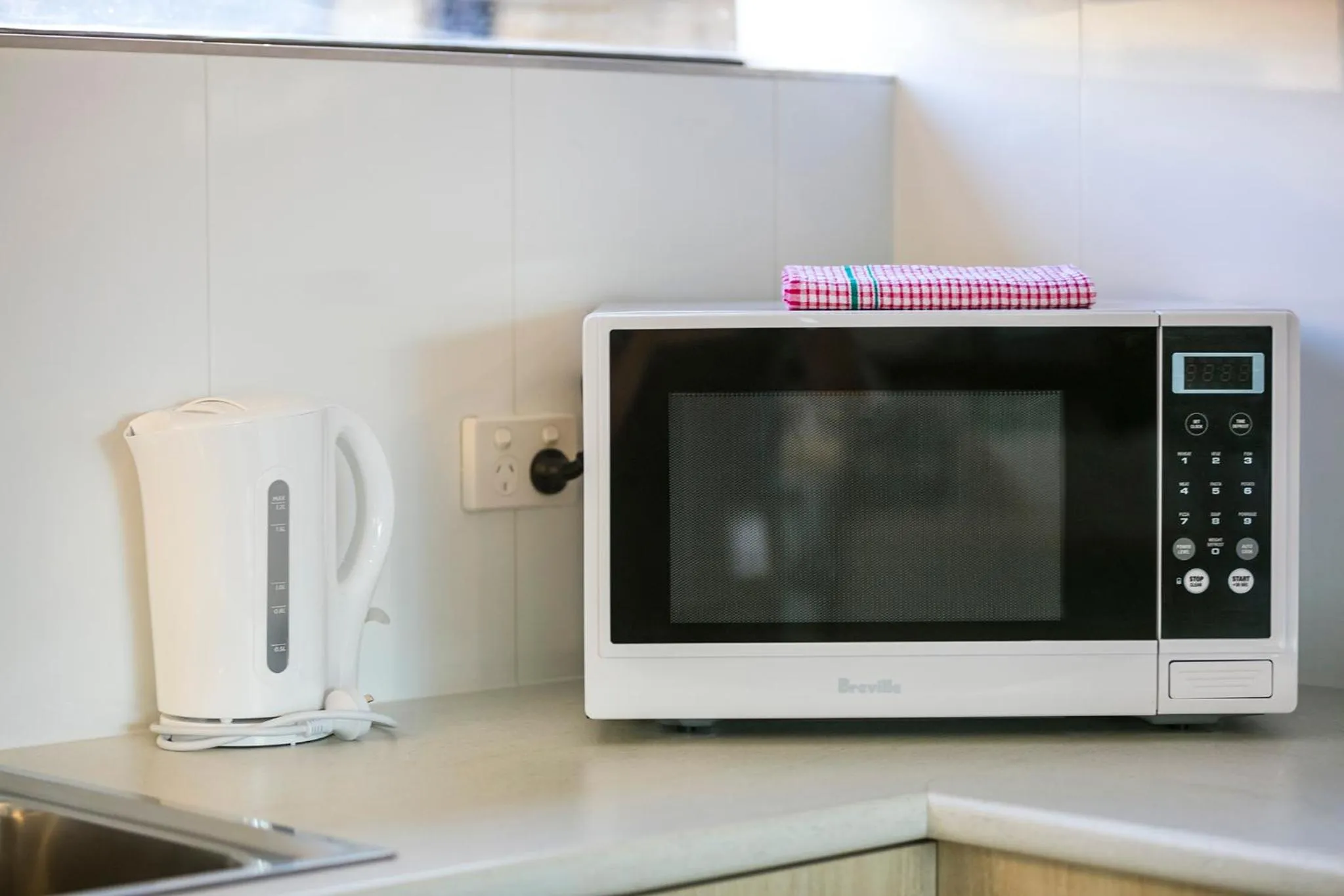 Kitchen or kitchenette in Nightcap at Kawana Waters Hotel