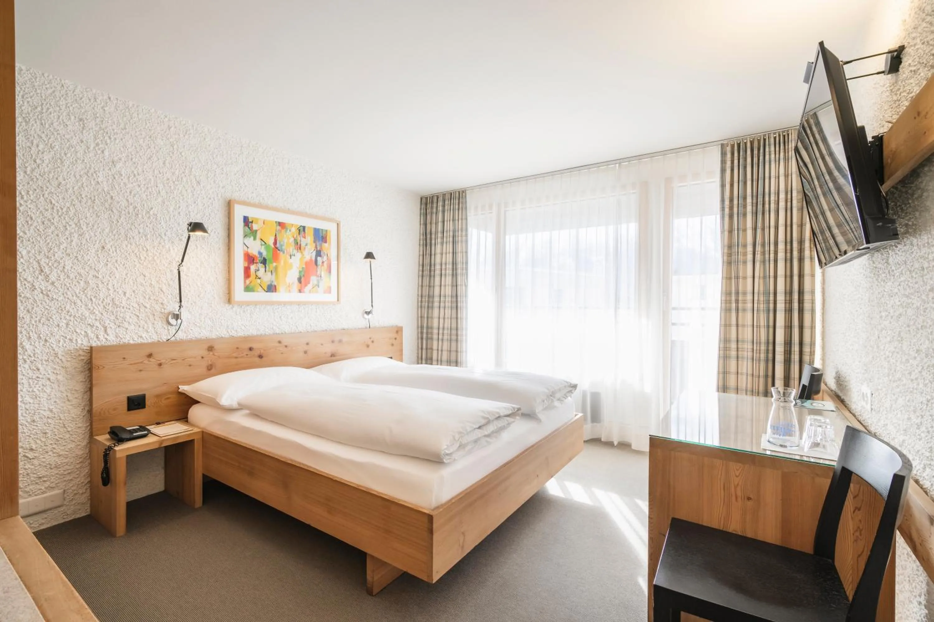 Bed in Hauser Hotel St. Moritz