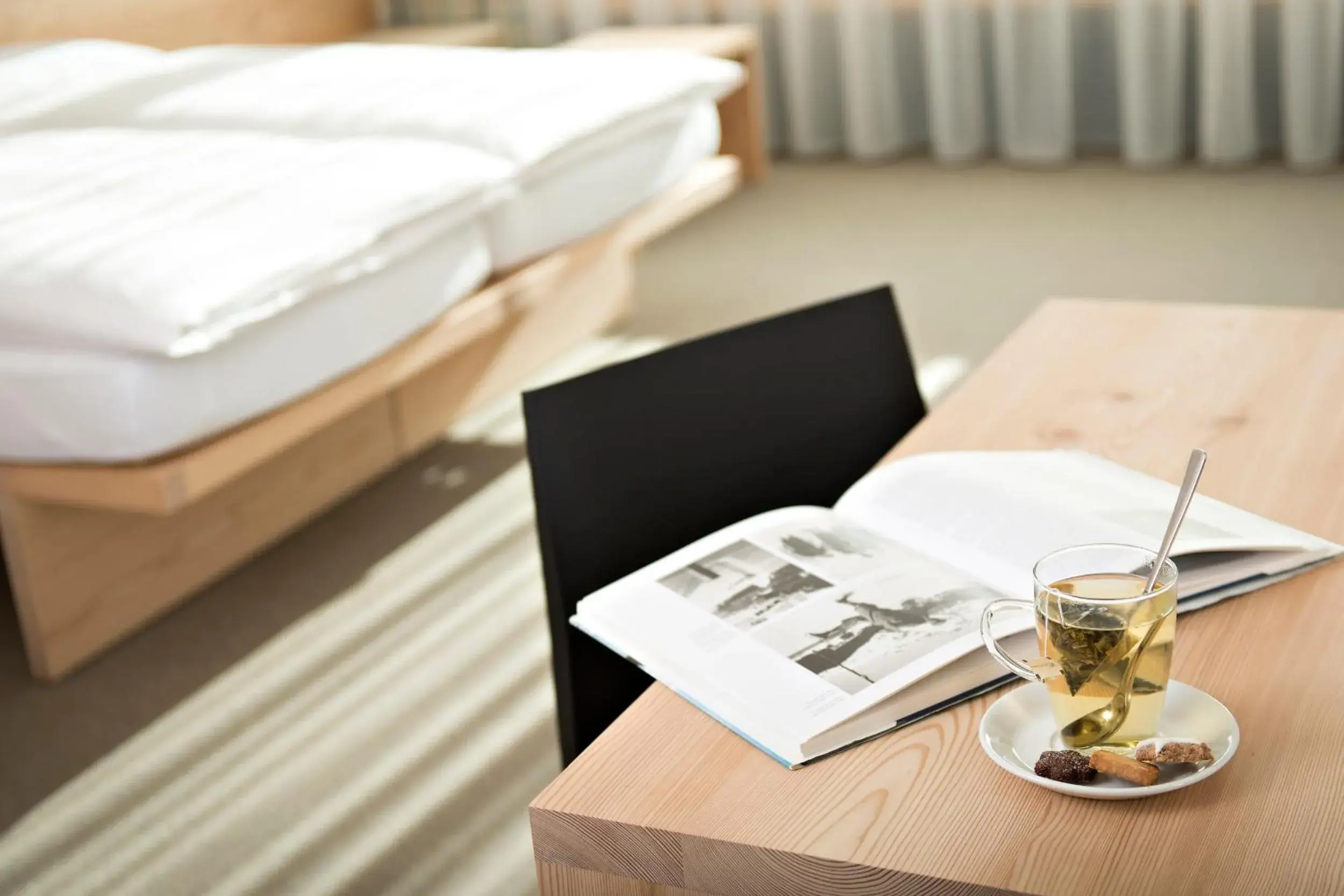 Coffee/tea facilities, Bed in Hauser Hotel St. Moritz Coffee/tea facilities, Bed in Hauser Hotel St. Moritz