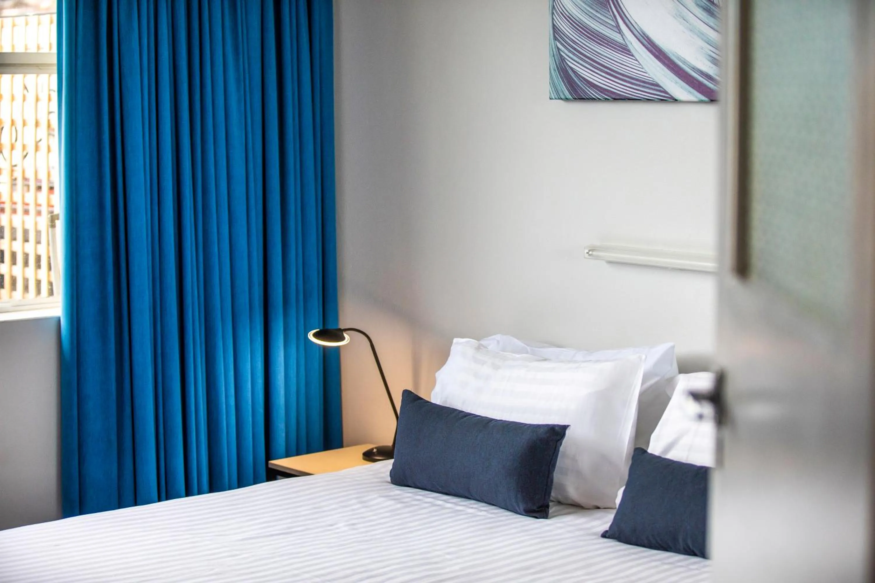 Bedroom, Bed in Nightcap at Carlyle Hotel