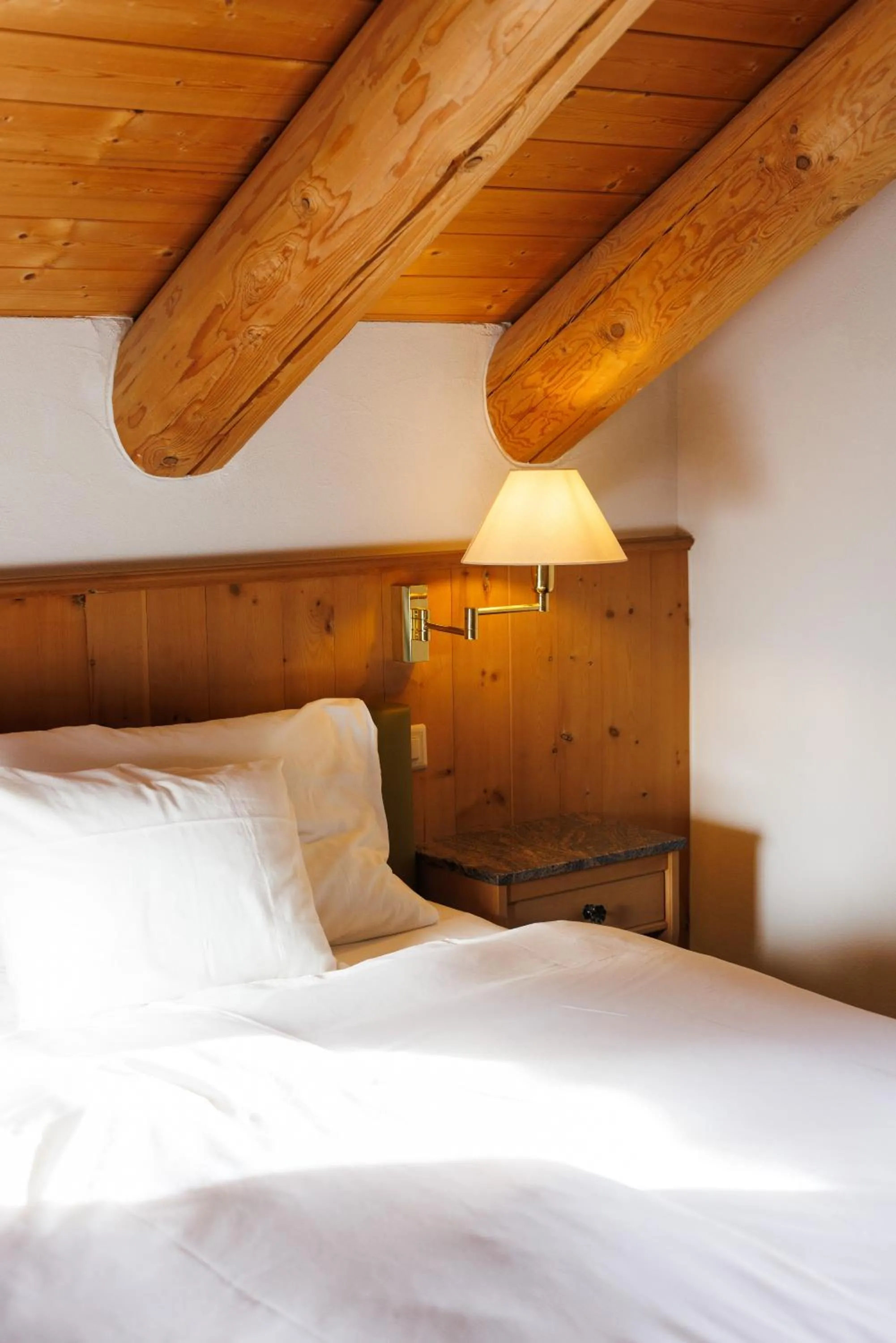 Bed in Hotel Chesa Rosatsch - Home of Food