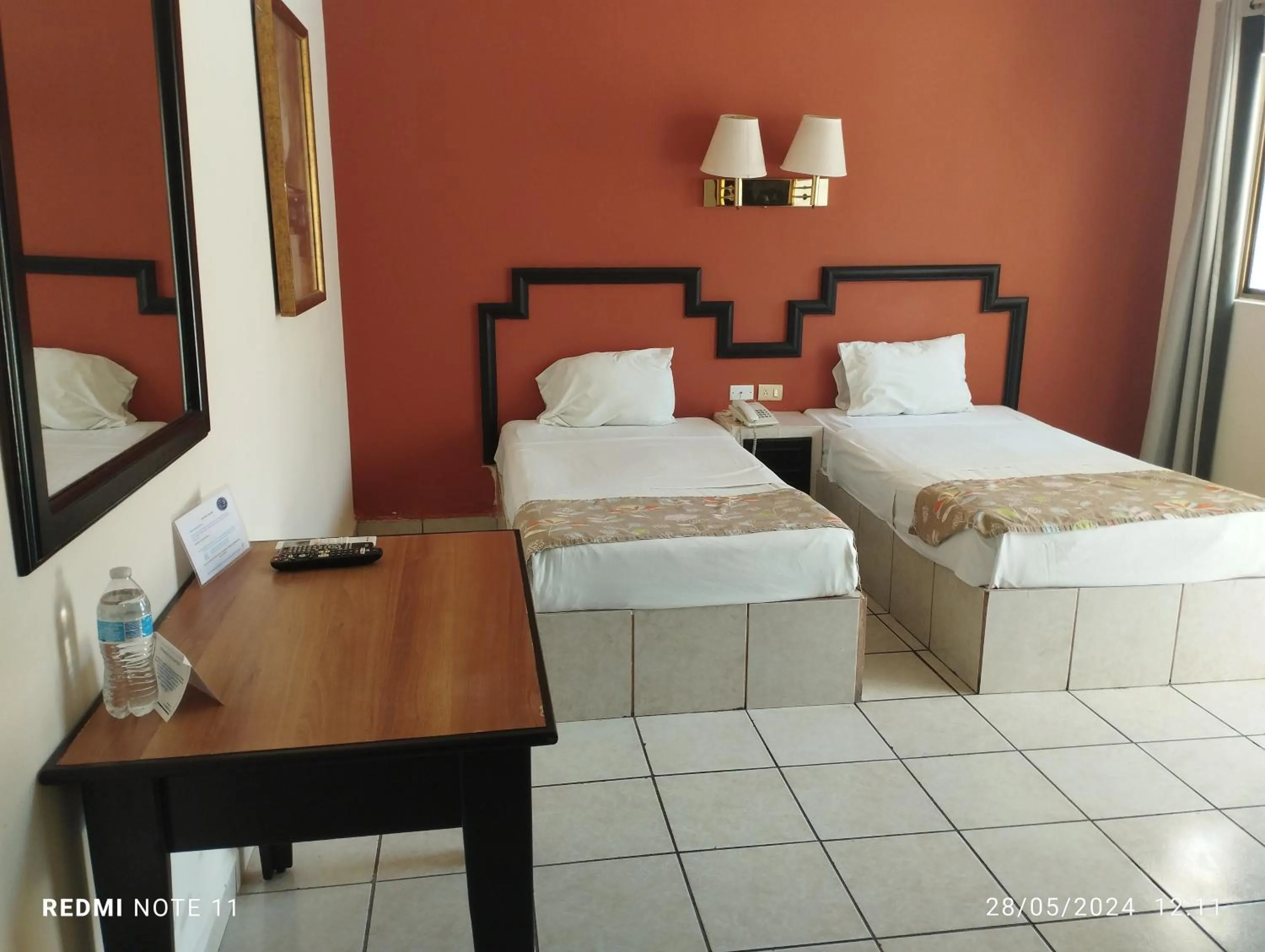 Bed in Hotel Hacienda Nainari