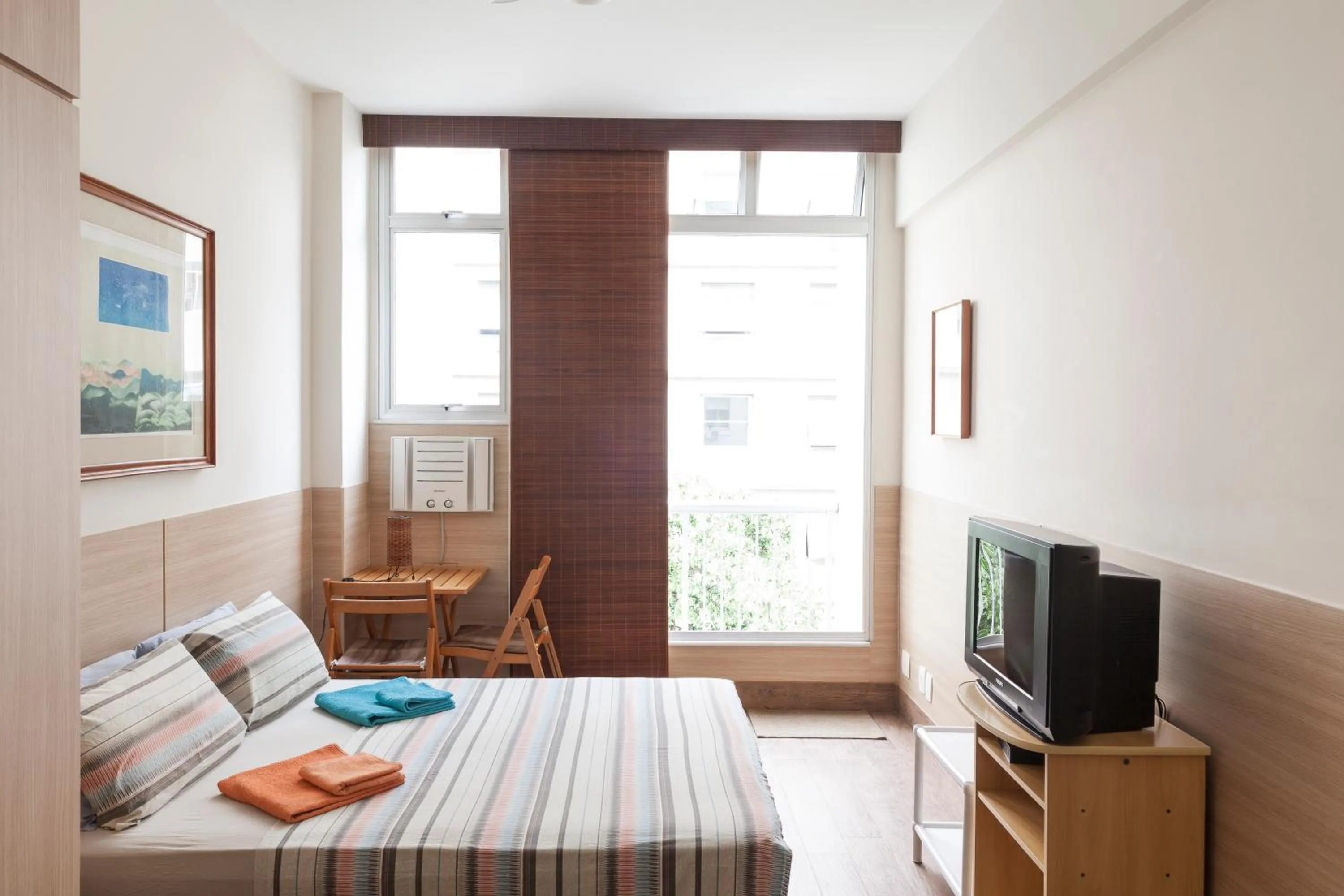 Day, Bed in Alex Rio Flats Studio with Balcony