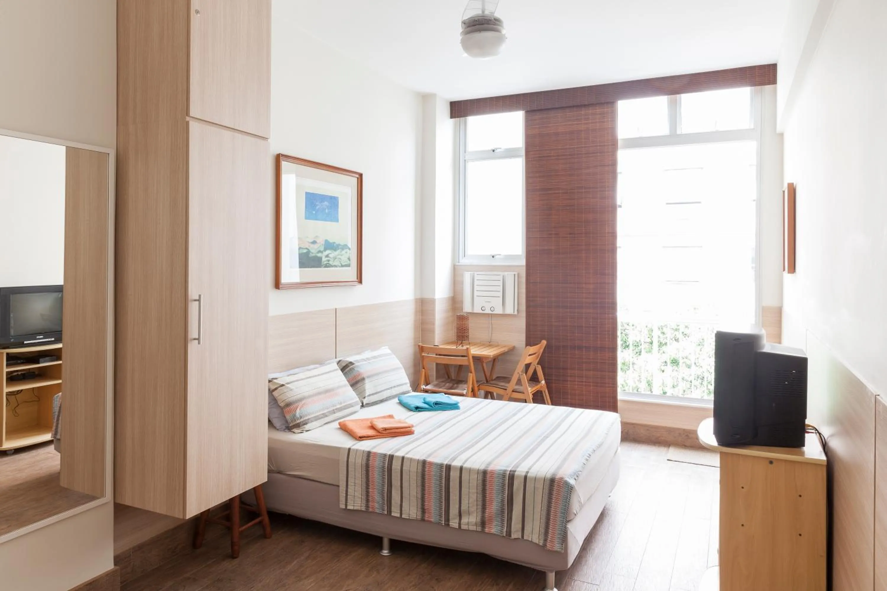 Day, Bed in Alex Rio Flats Studio with Balcony
