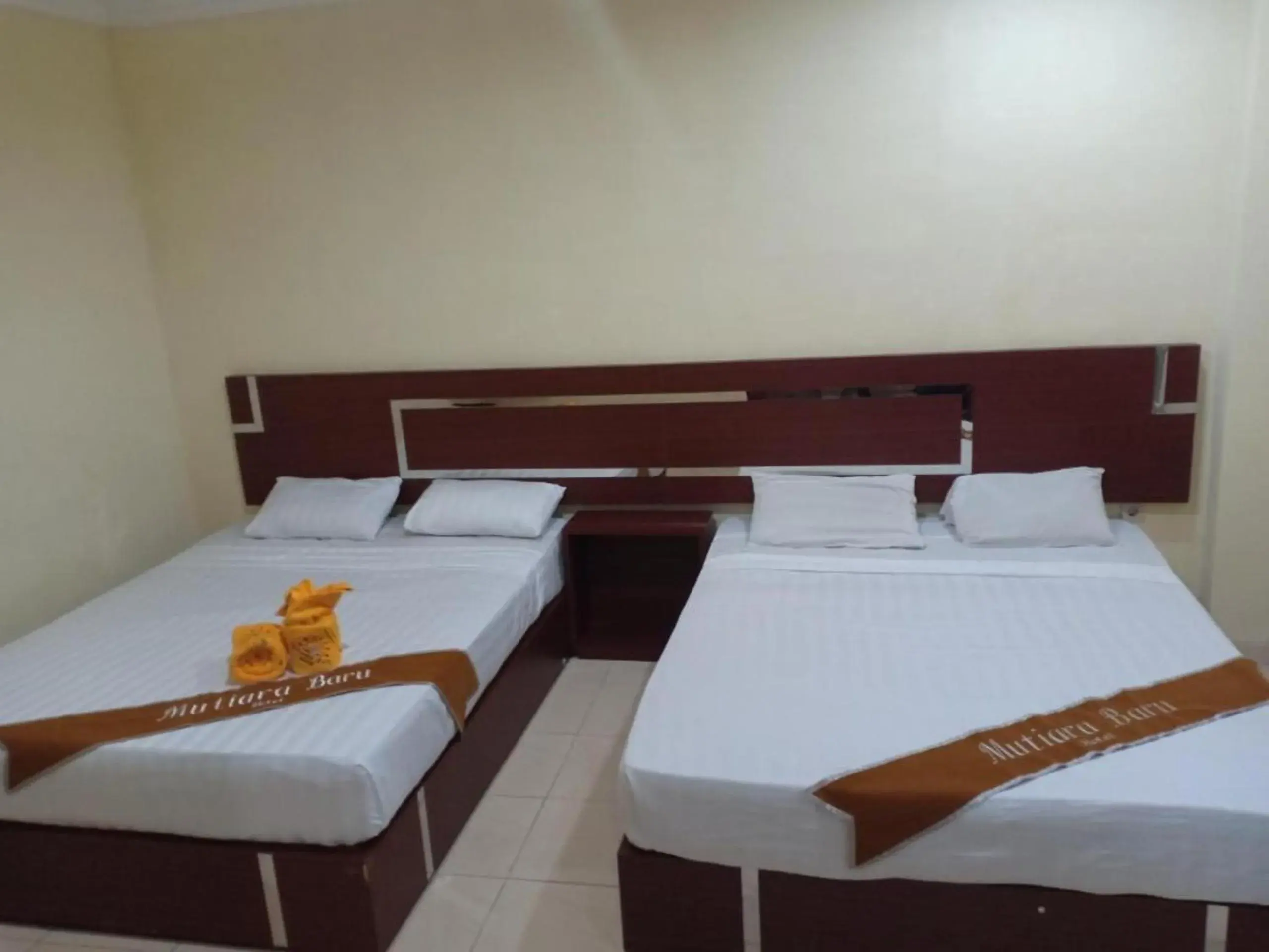 Photo of the whole room, Bed in Hotel Mutiara Baru Photo of the whole room, Bed in Hotel Mutiara Baru