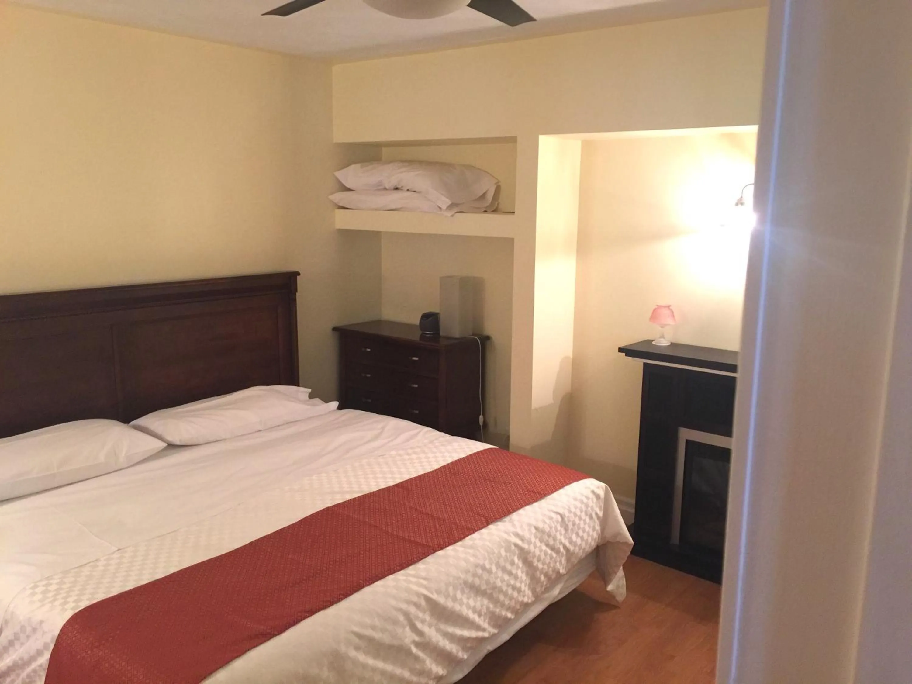 Bed in Grey Rose Suites