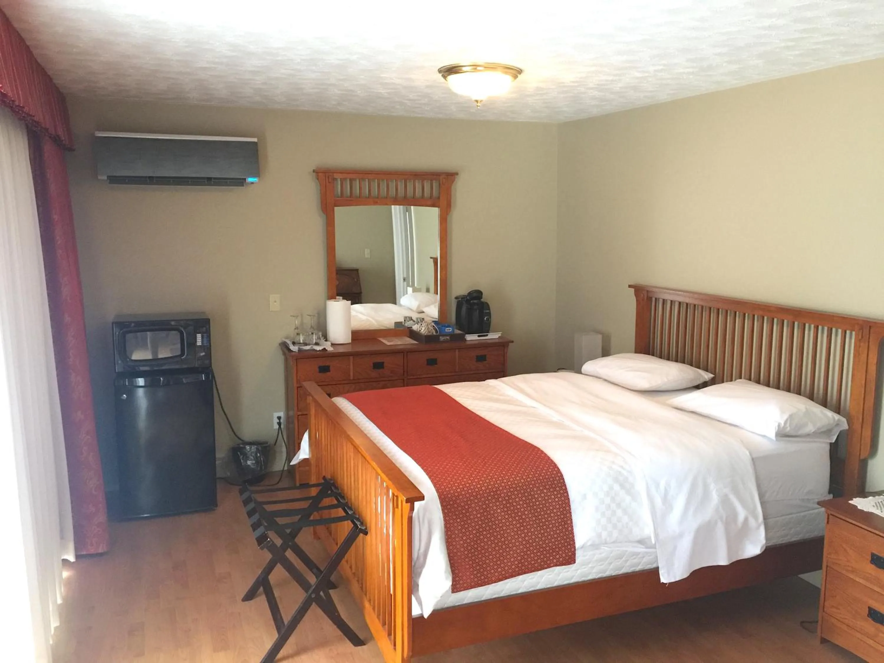 Bed in Grey Rose Suites