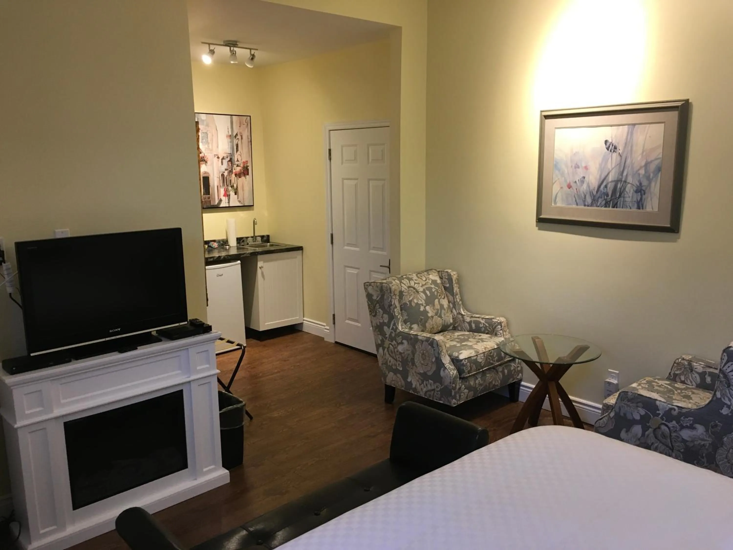 Bed in Grey Rose Suites