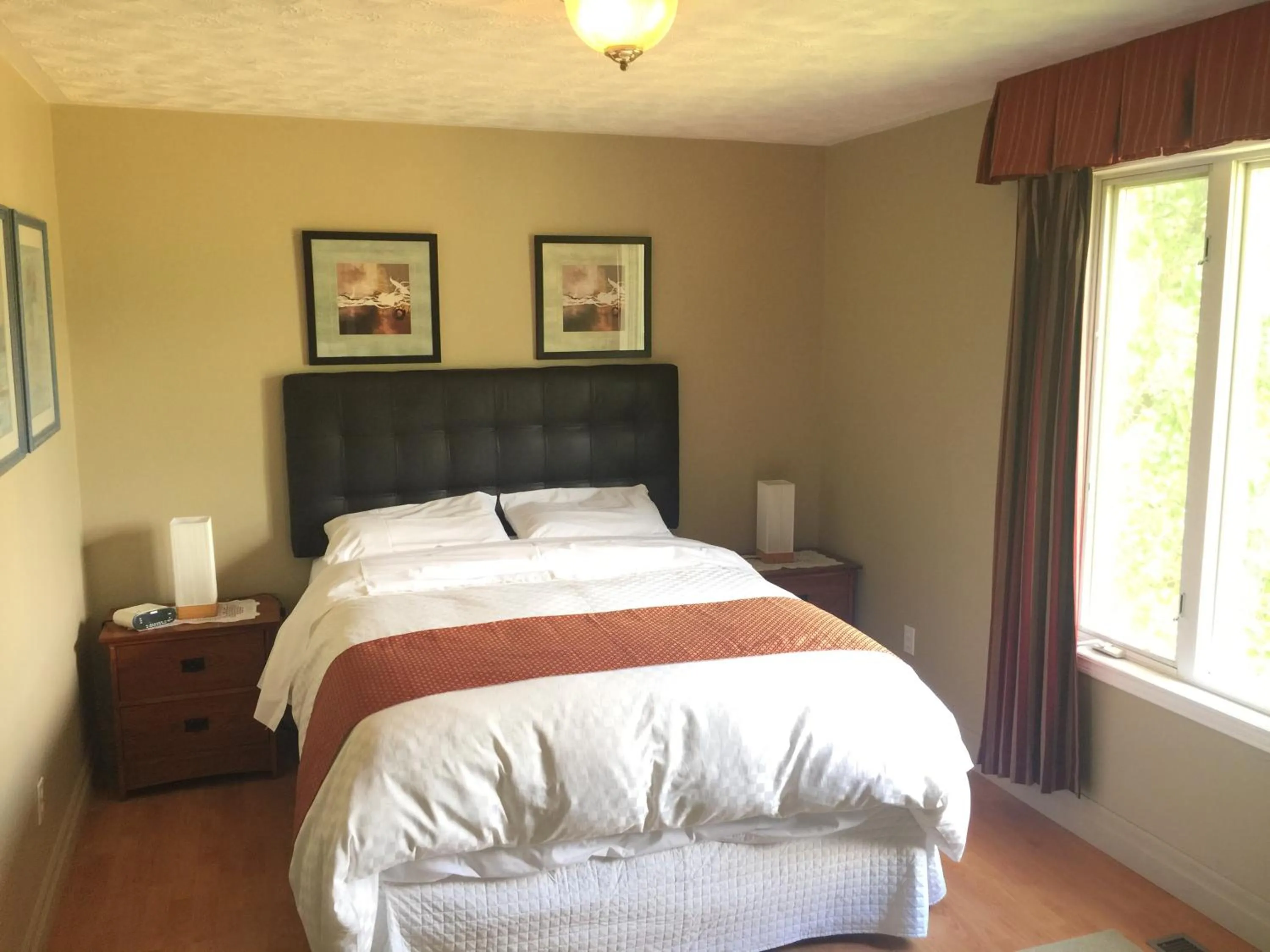 Bed in Grey Rose Suites