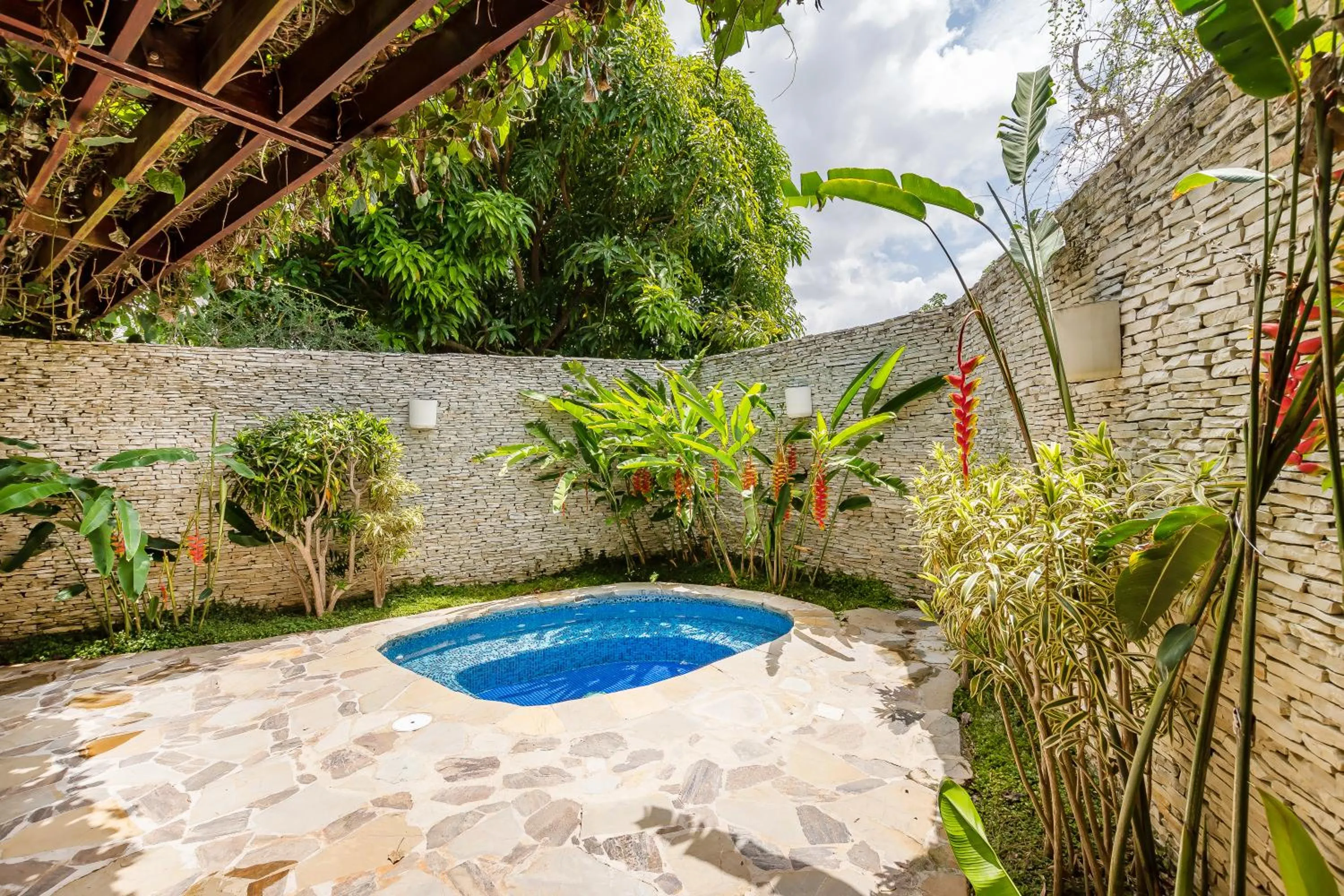 Garden in Unique Villa with Ocean and River Views - Staff & Golf Carts