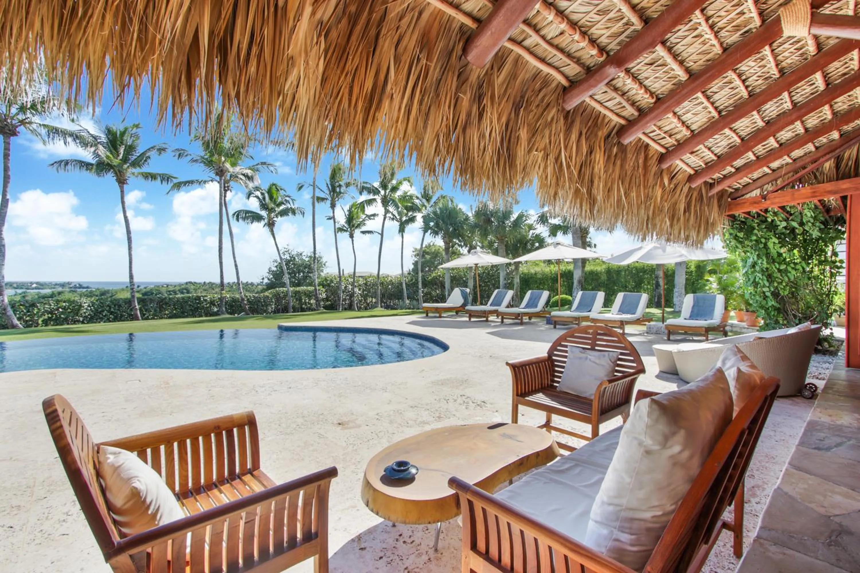Patio in Unique Villa with Ocean and River Views - Staff & Golf Carts
