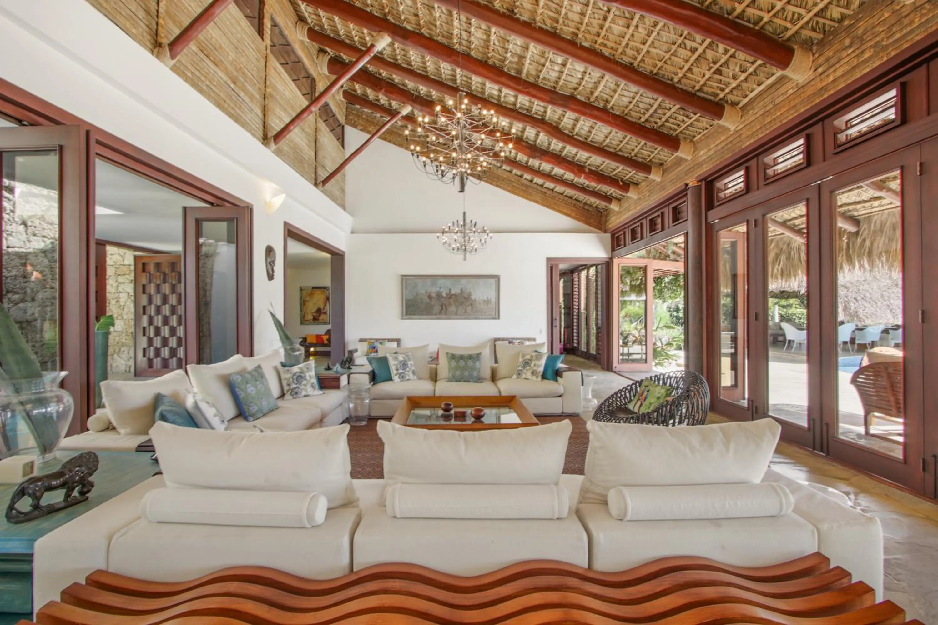 Living room in Unique Villa with Ocean and River Views - Staff & Golf Carts