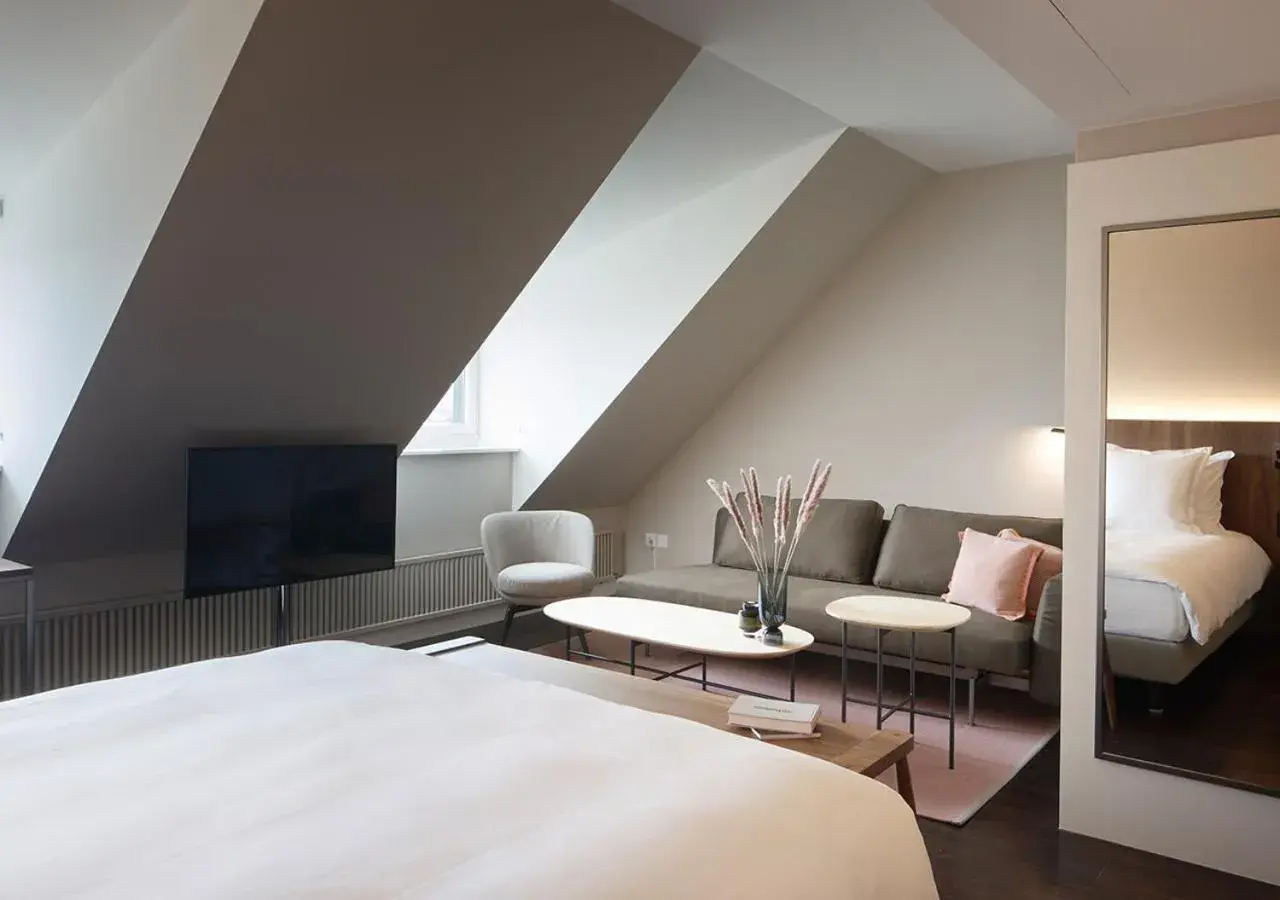 Photo of the whole room, Bed in Sorell Hotel Zürichberg Photo of the whole room, Bed in Sorell Hotel Zürichberg