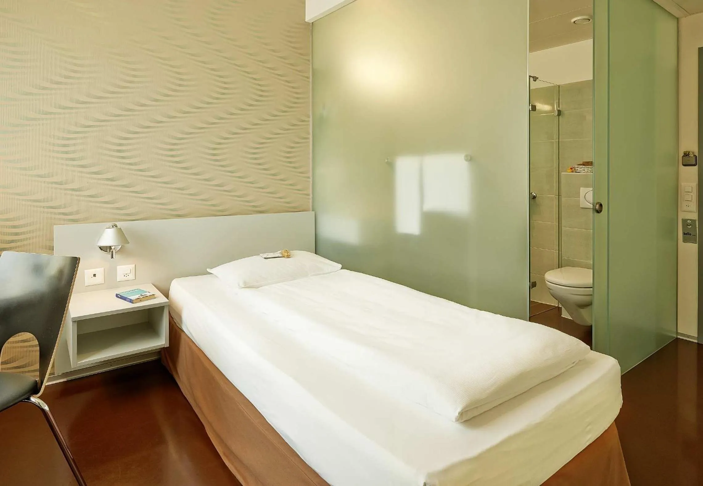 Photo of the whole room, Bed in Sorell Business Hotel Ador Bern