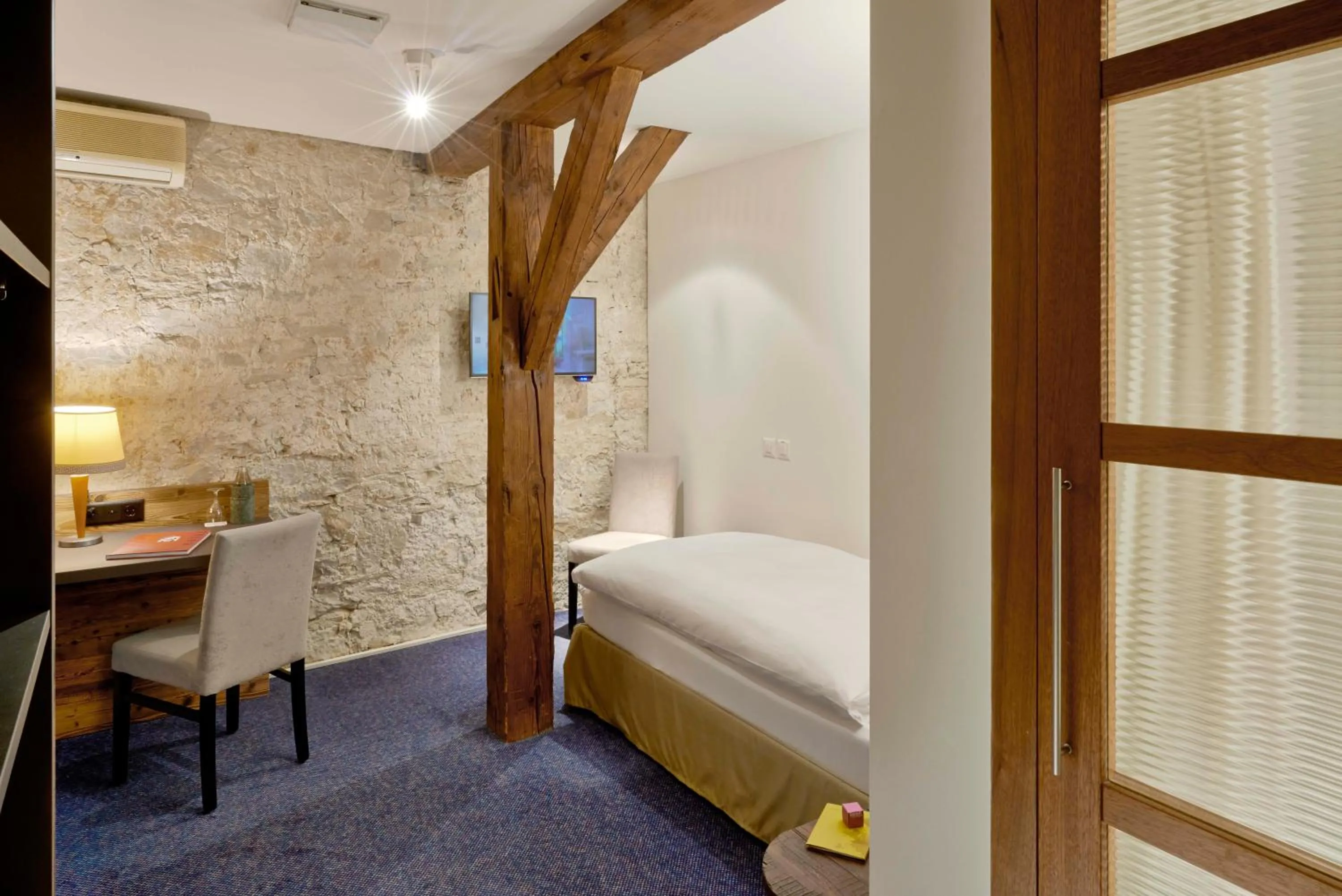 Bed in Boutique-Hotel Rüden