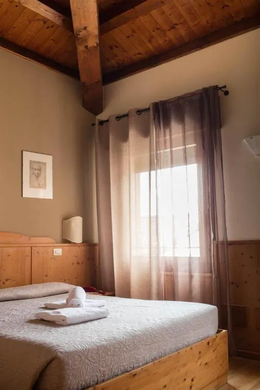 Bed in Locanda Montegrappa