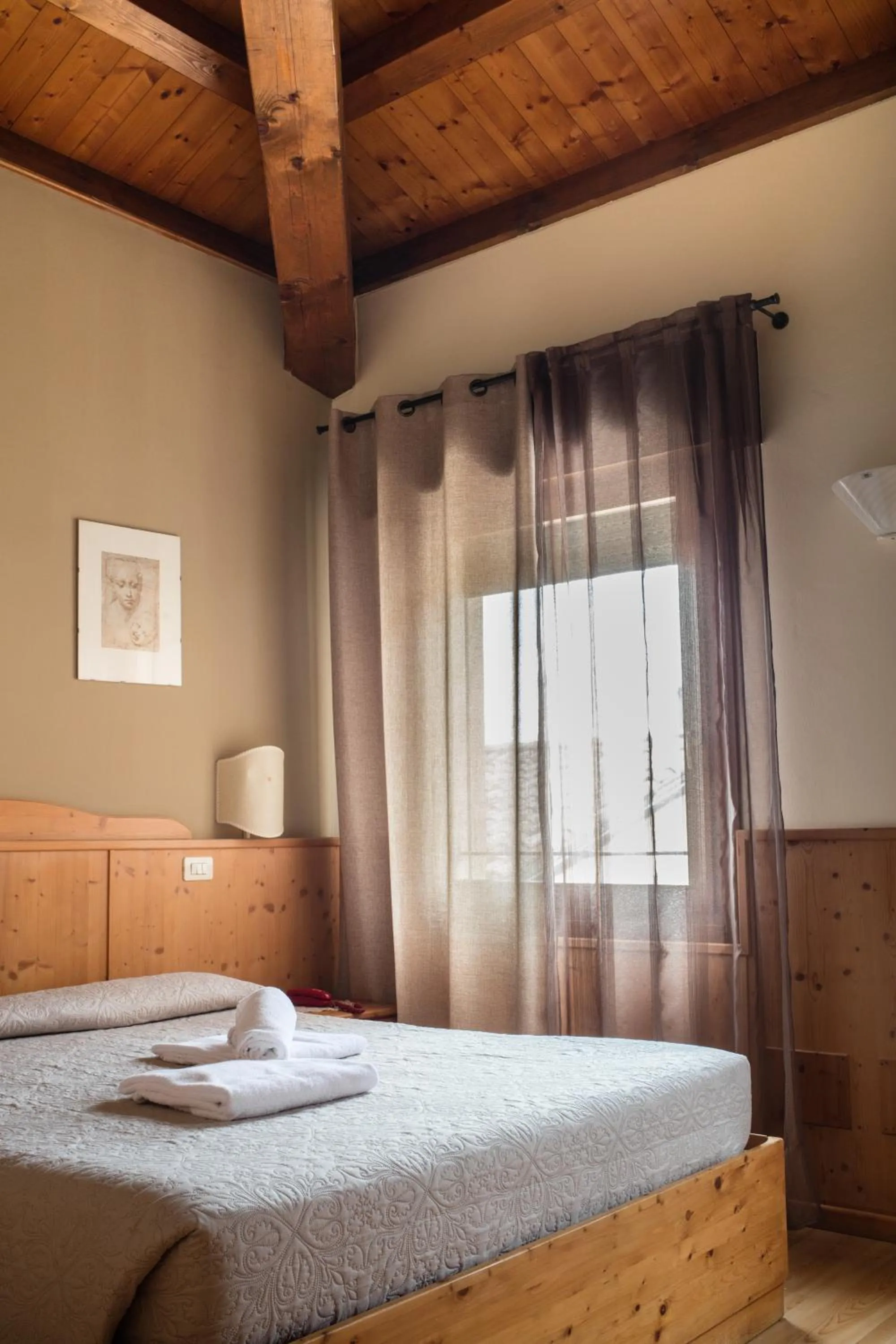 Bed in Locanda Montegrappa