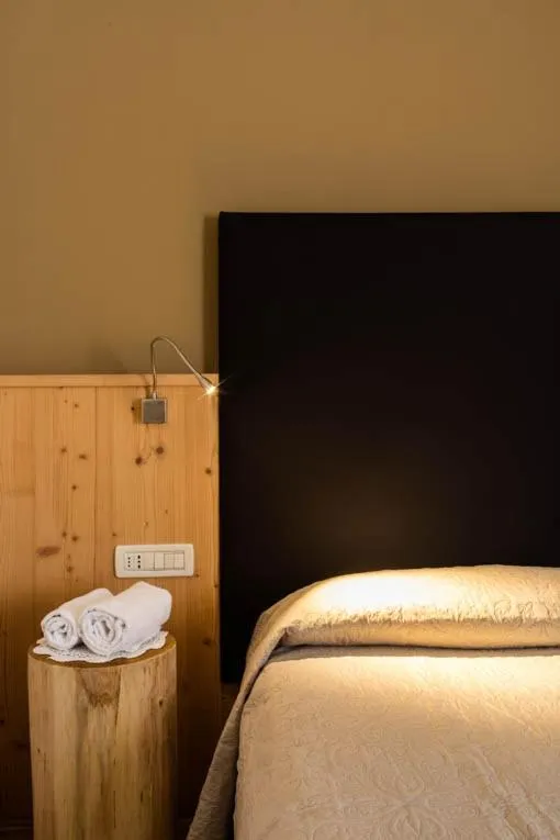 Bed in Locanda Montegrappa