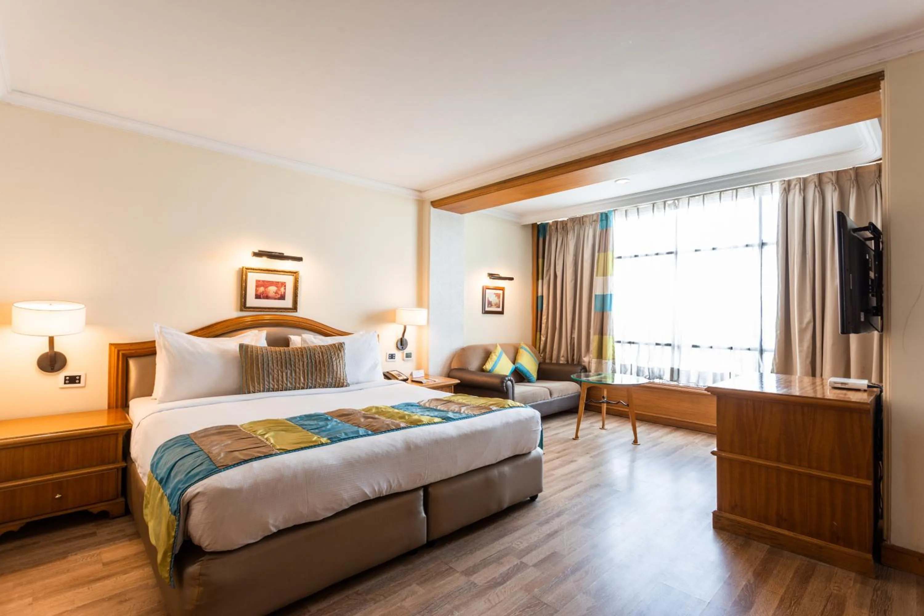 Photo of the whole room, Bed in The Maya Hotel