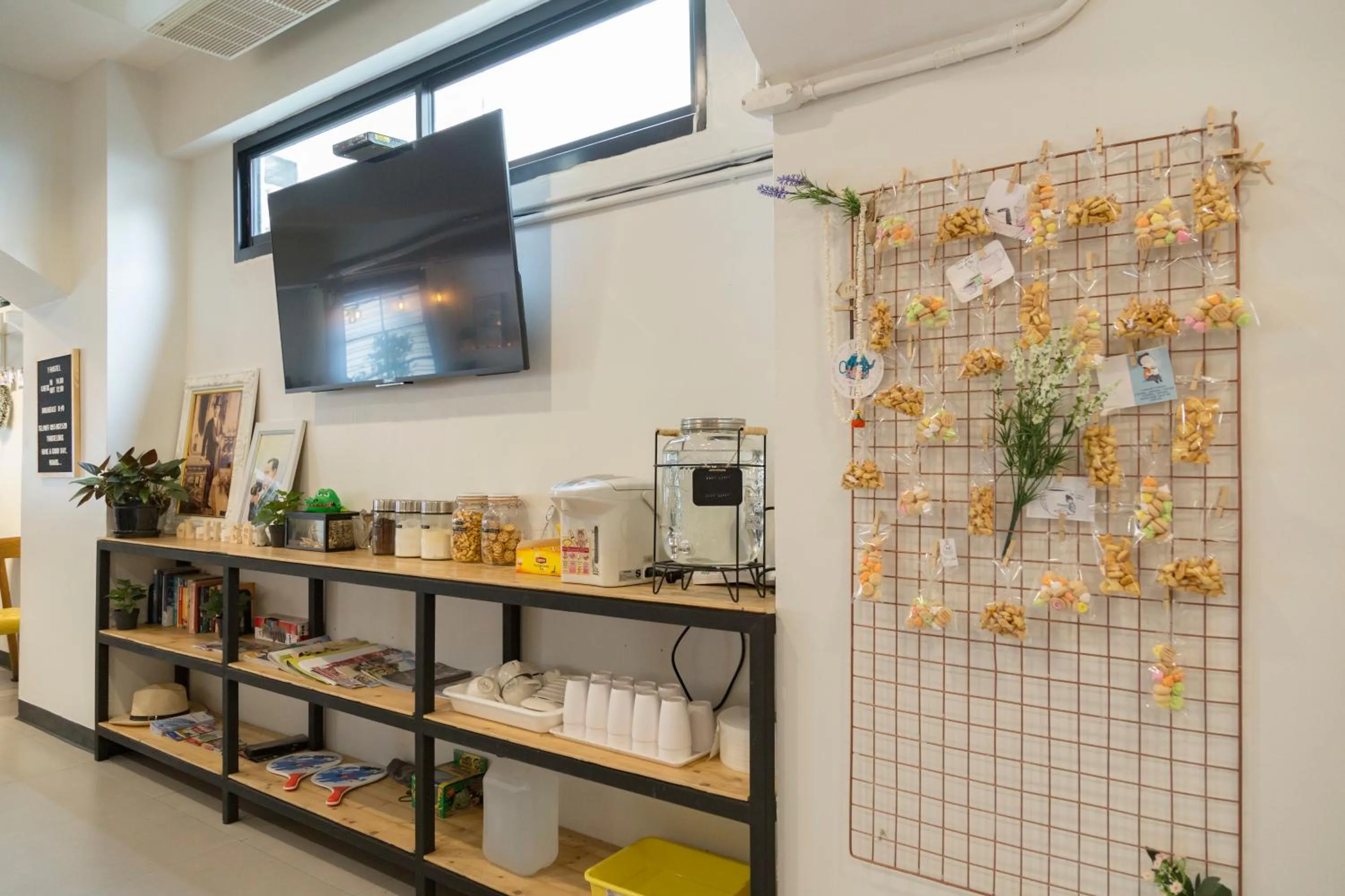 Communal lounge/ TV room in T Hostel @ Victory Monument