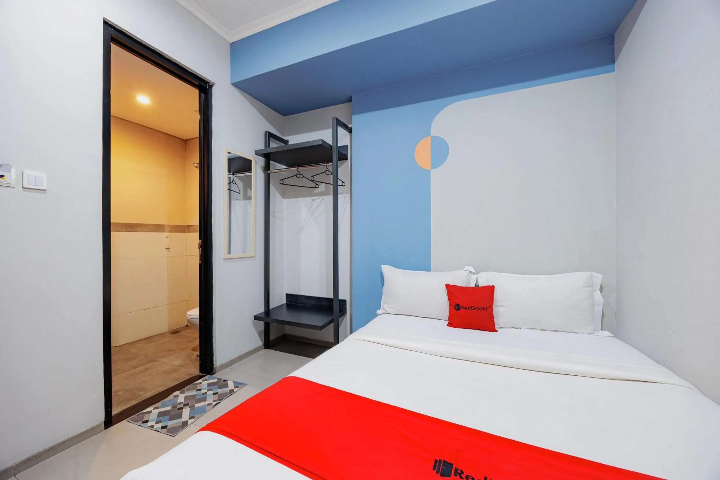 Bed in RedDoorz Plus near Radio Dalam 3