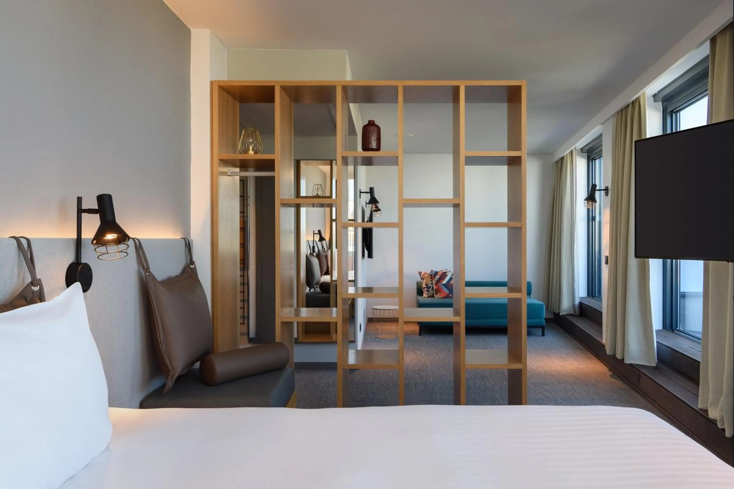 Photo of the whole room, Bed in Moxy Lisbon City