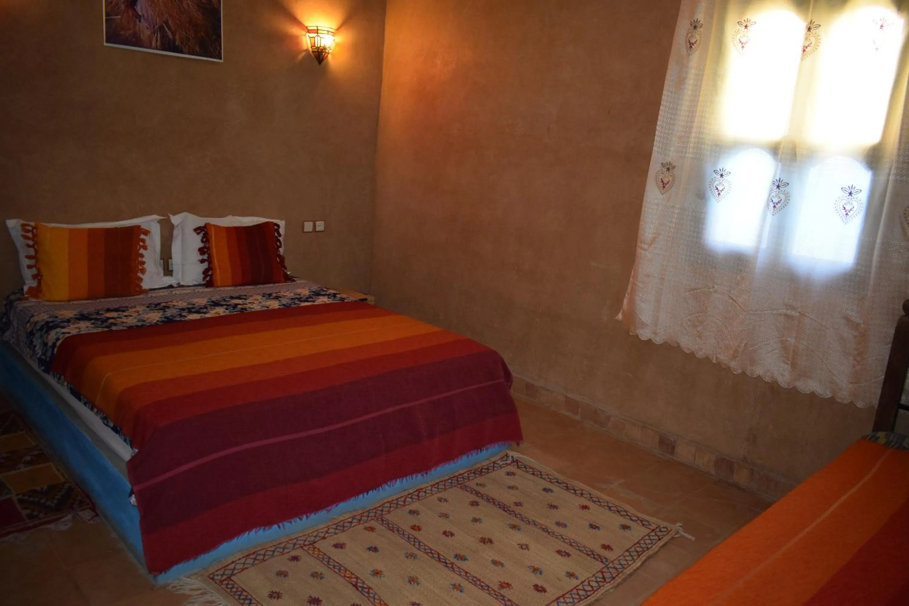 Bed in Maison d'hotes la tour de toile