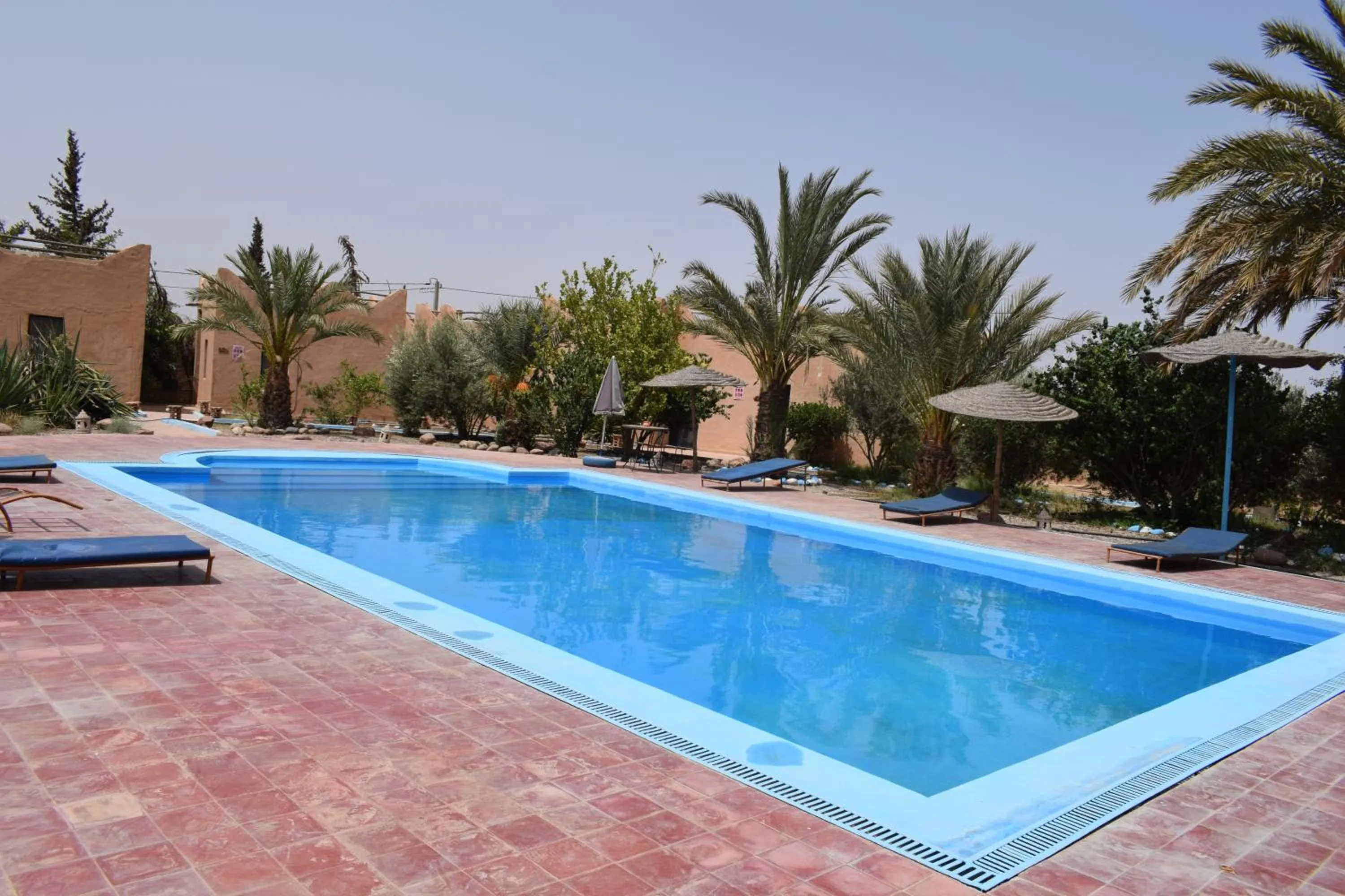 Swimming pool in Maison d'hotes la tour de toile